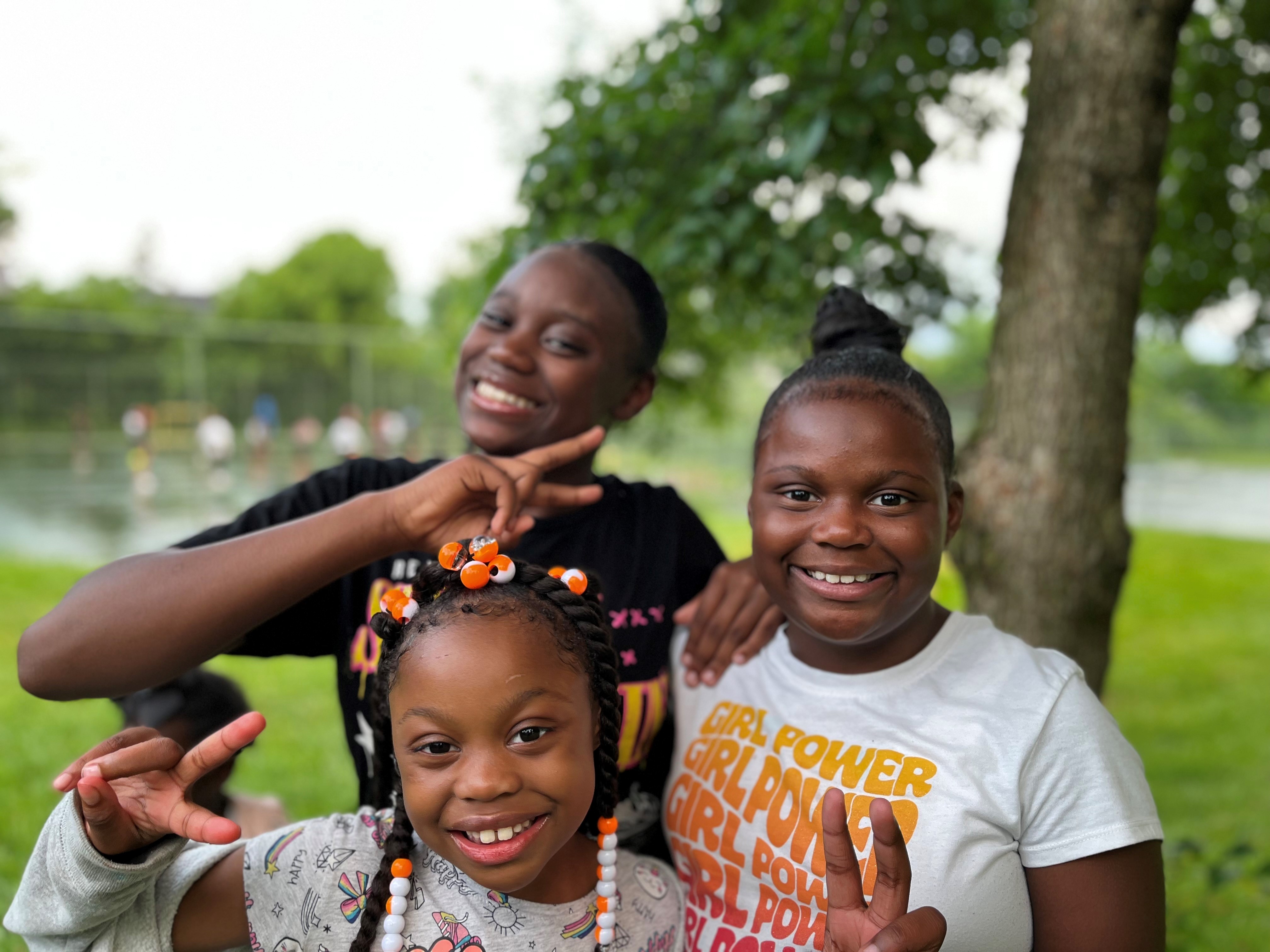 Malaysia Treadwell, 9, is captain of her peewee drill team, and Maxzaira Harvey, 12, is also a member of the dance, drill and drum group.  Maleeya Treadwell, 8, is also pictured.  CORNELIUS FROLIK / STAFF