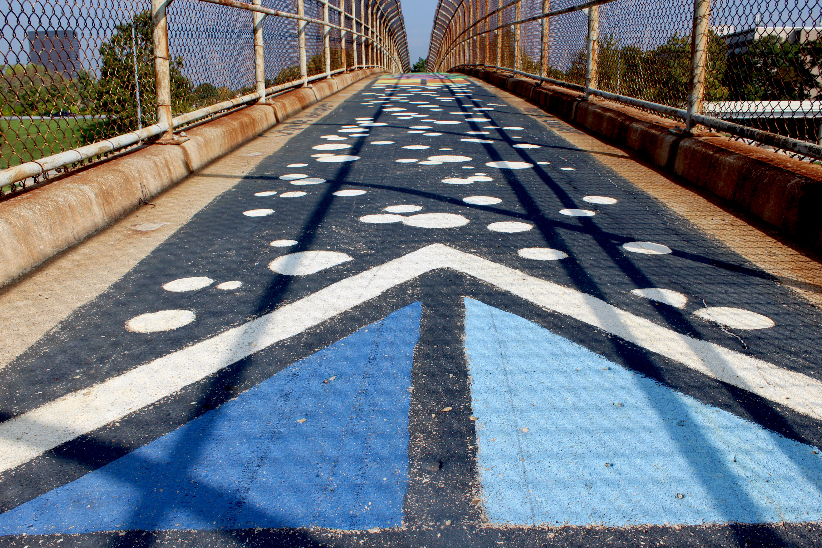 The US 35 pedestrian bridge between South Park and the Oregon District was painted by upDayton volunteers in 2012.