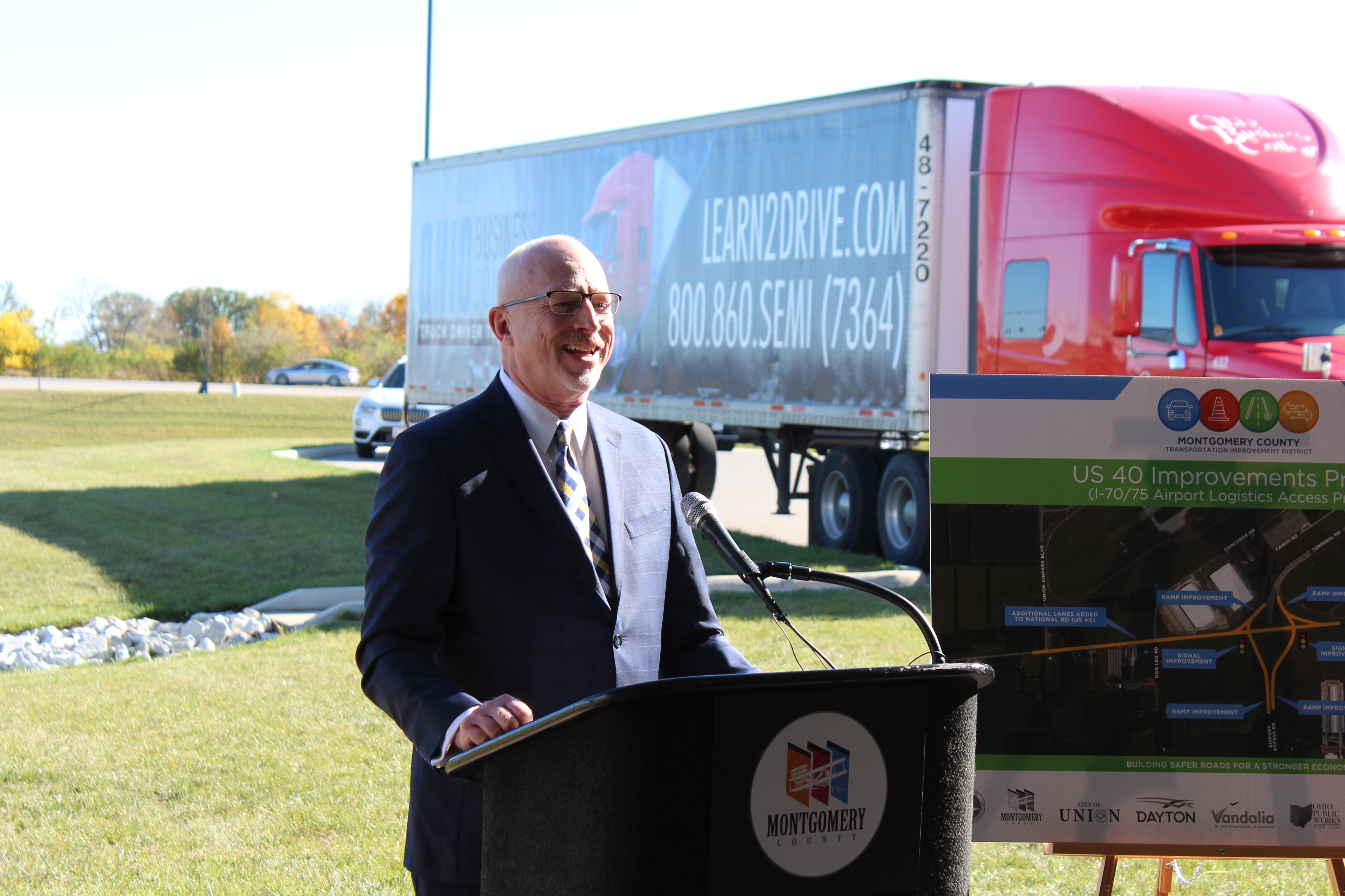 Steve Stanley, then-executive director of the Montgomery County Transportation Improvement District, at the groundbreaking for expanding US 40 near the Dayton International Airport last year.  Stanley retired as executive director and is now a development specialist at the TID.