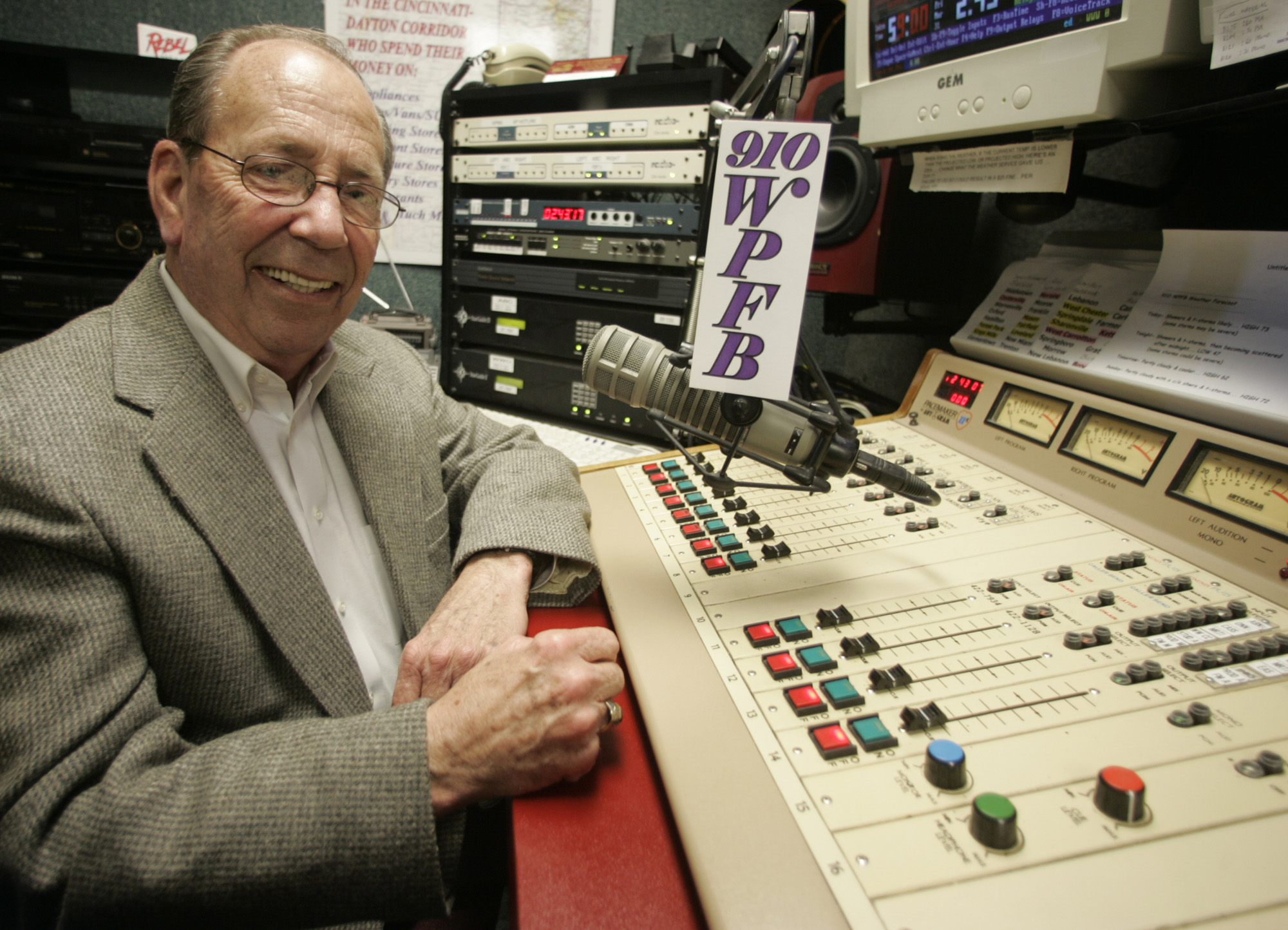 This 2006 file photo shows Russell Dwyer, a former Middletown police chief, at the WPFB radio station in Middletown. Dwyer was an on-air news reporter for the radio station.