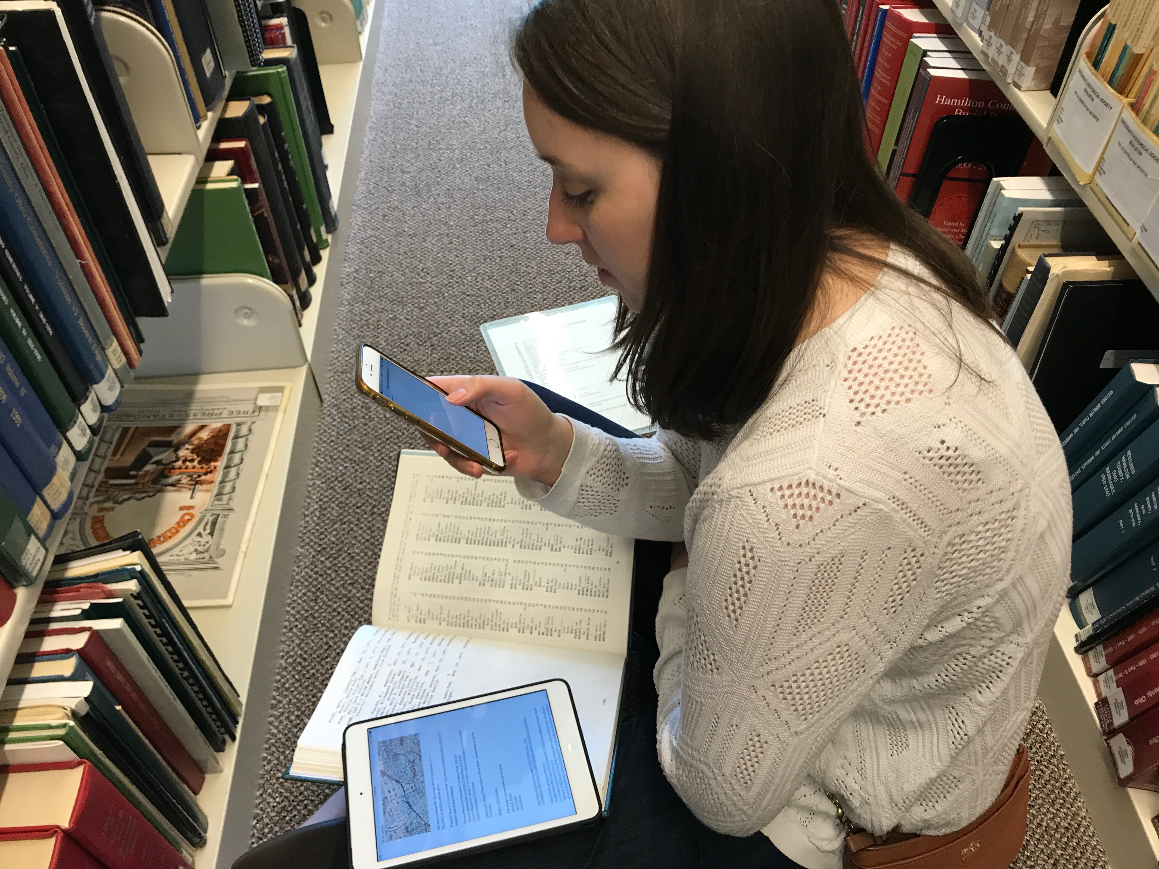 On and off over two year, George Drake Jr. lead a team that includes his wife, Ruth Reveal, and a farmer named Jessi Sievers on a quest to piece together the real-life story behind a letter found under an Oakwood bathtub. The result if the podcast Fifth and Ludlow. Ruth Reveal is pictured at Ohio Genealogical Society.