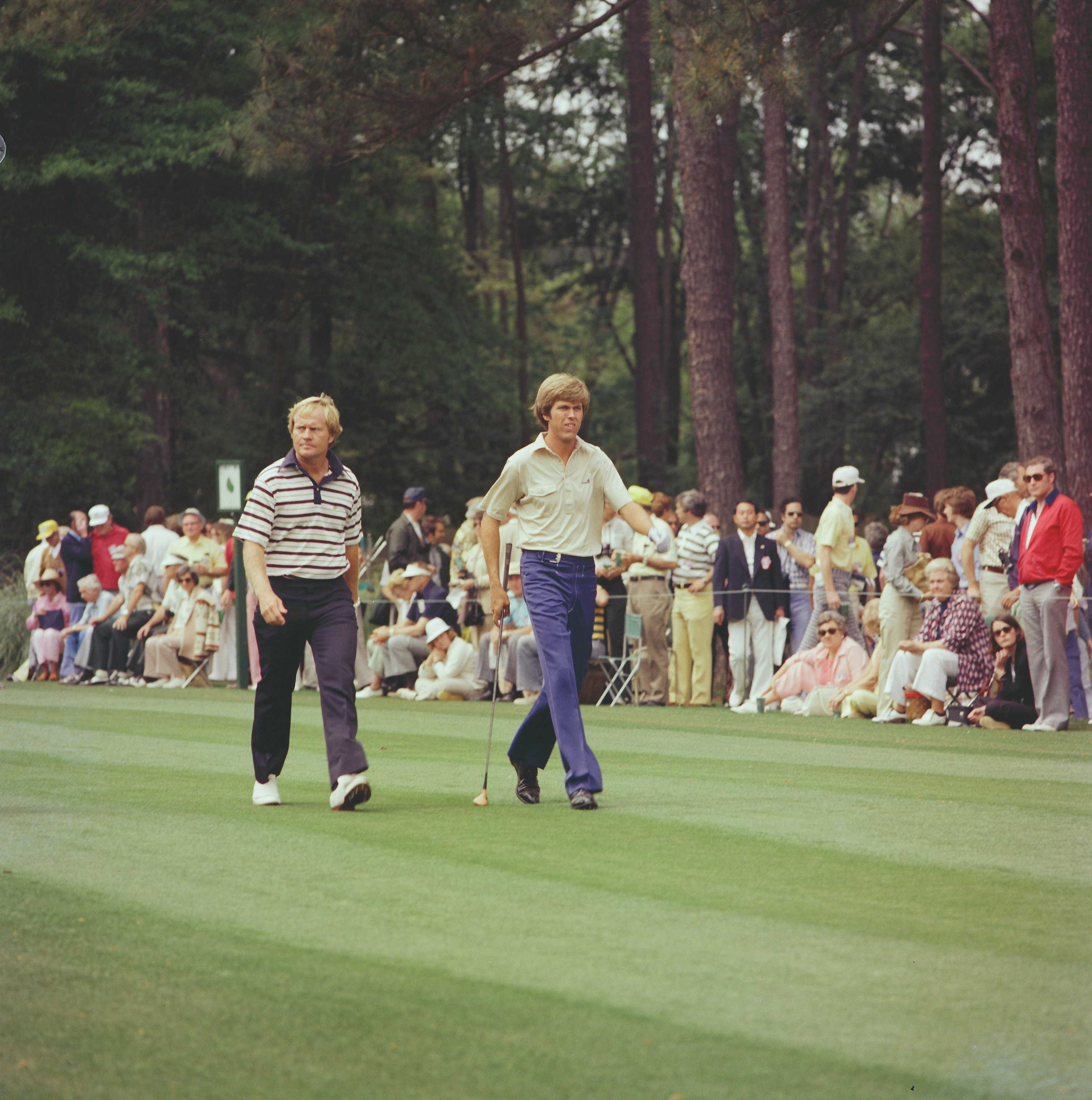 AUGUSTA, GA - APRIL 1976: Jack Nicklaus and Fred Ridley stride down the 14th fairway during the 1976 Masters Tournament at Augusta National Golf Club in April 1976 in Augusta, Georgia. (Photo by Augusta National/Getty Images)