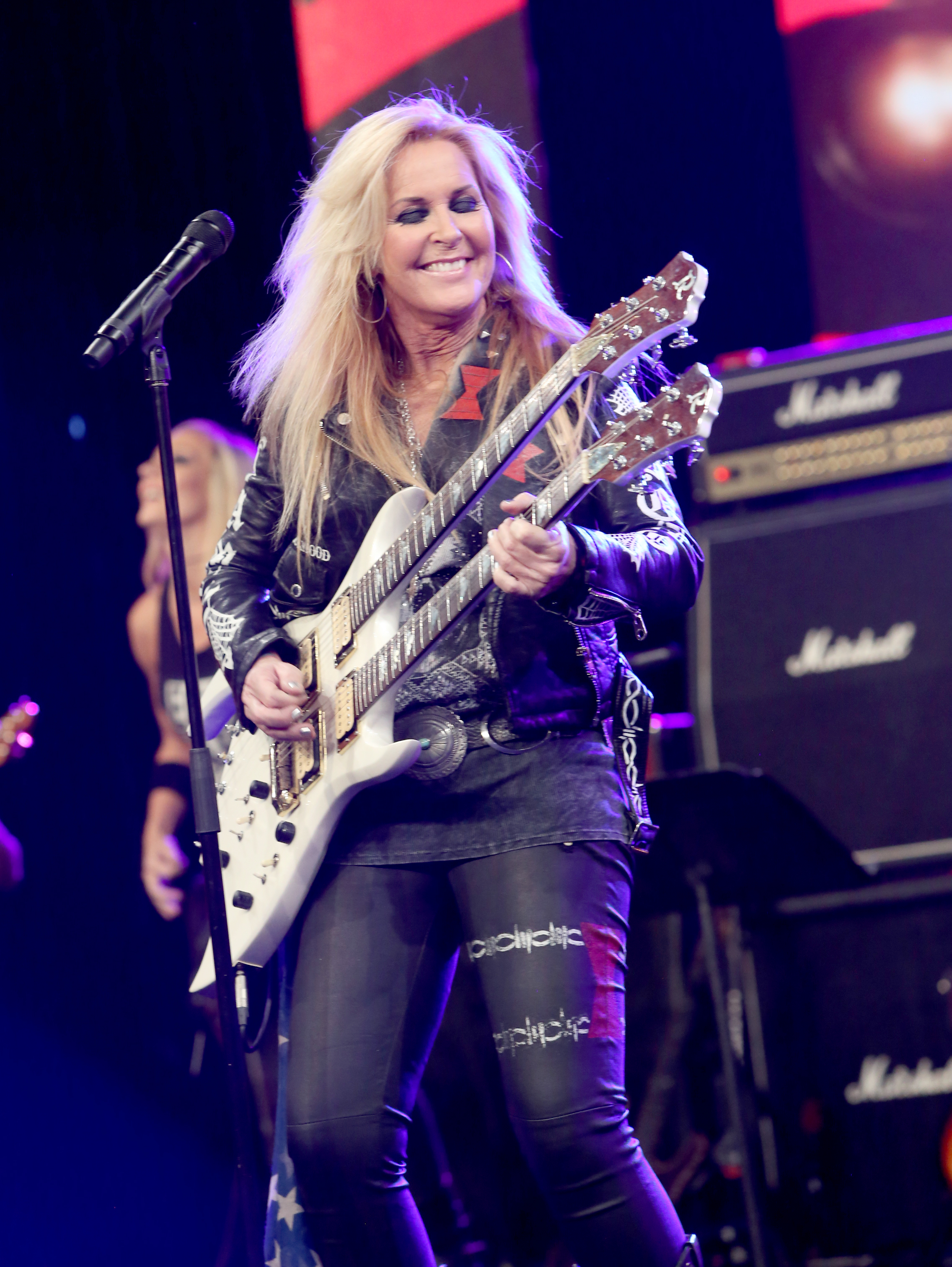 ANAHEIM, CA - JANUARY 20: Guitarist Lita Ford performs on stage at the She Rocks Awards during the 2017 NAMM Show at the Anaheim Convention Center on January 20, 2017 in Anaheim, California. (Photo by Jesse Grant/Getty Images for NAMM)