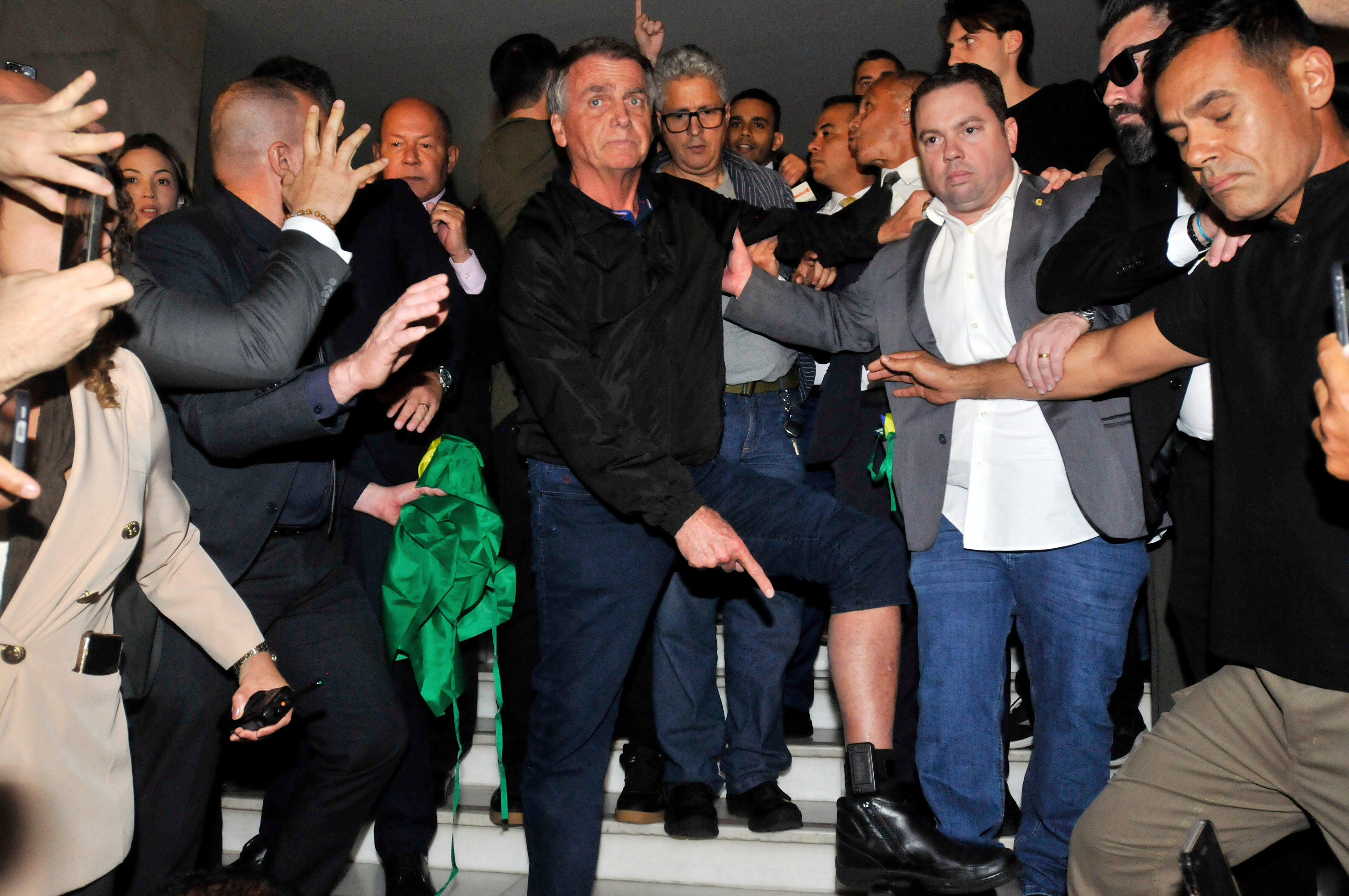 Bolsonaro returns to prison in Brazil after undergoing medical examinations following fall from bed