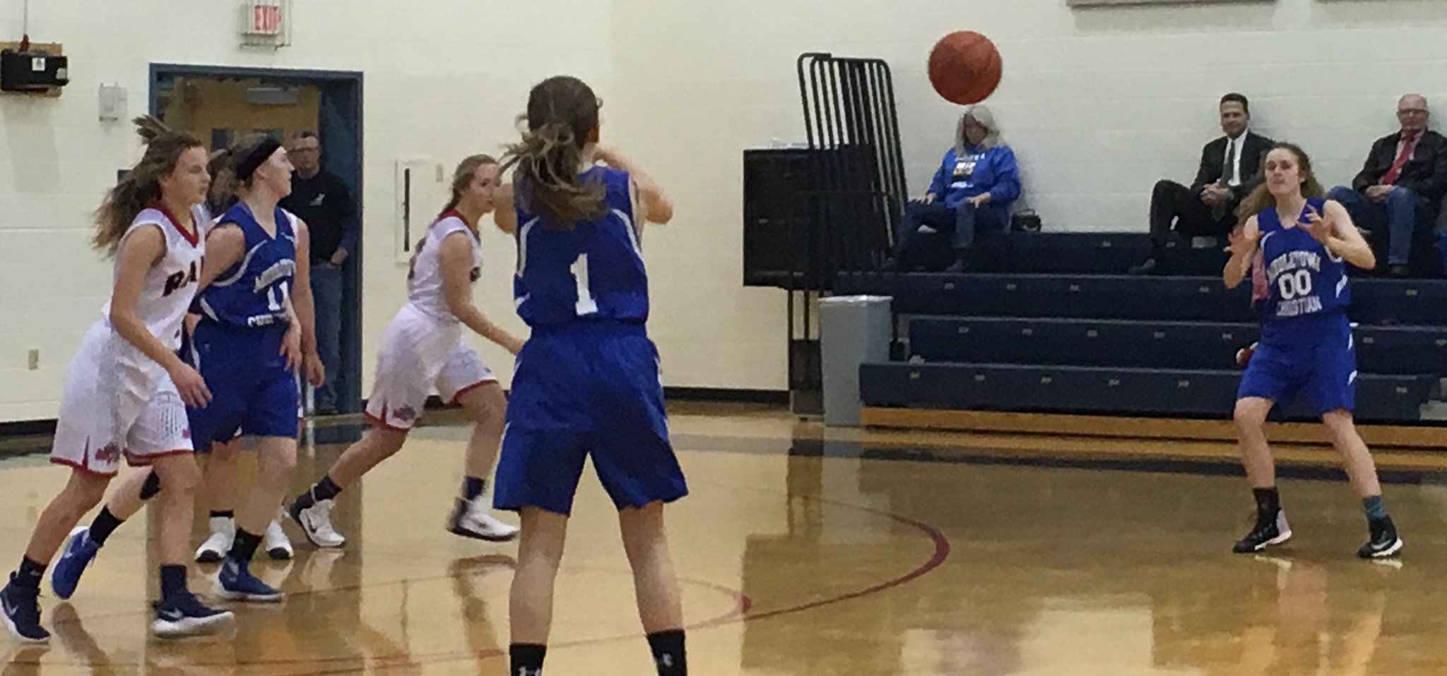 Middletown Christian’s Marissa Lykins (1) sends a pass toward teammate Anna Crawford (00) during Thursday night’s game against Miami Valley at Lane Gymnasium in Washington Township. RICK CASSANO/STAFF