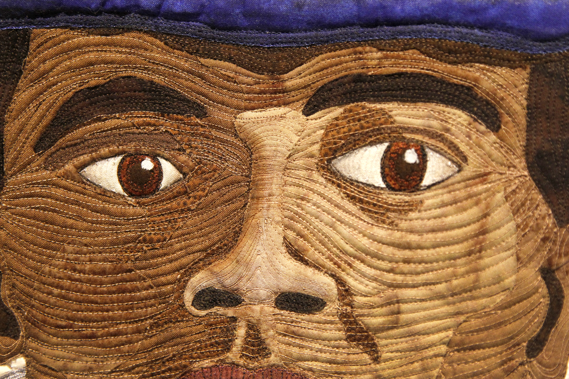 A detail of a quilt made by artist Renee Fleuranges-Valdes and part of the exhibition "Yours For Race and Country: Reflections on the Life of Colonel Charles Young," On display at the National Afro-American Museum & Cultural Center in Wilberforce, the collection of 33 quilts is created by the Women of Color Quilters Network and Friends. LISA POWELL / STAFF