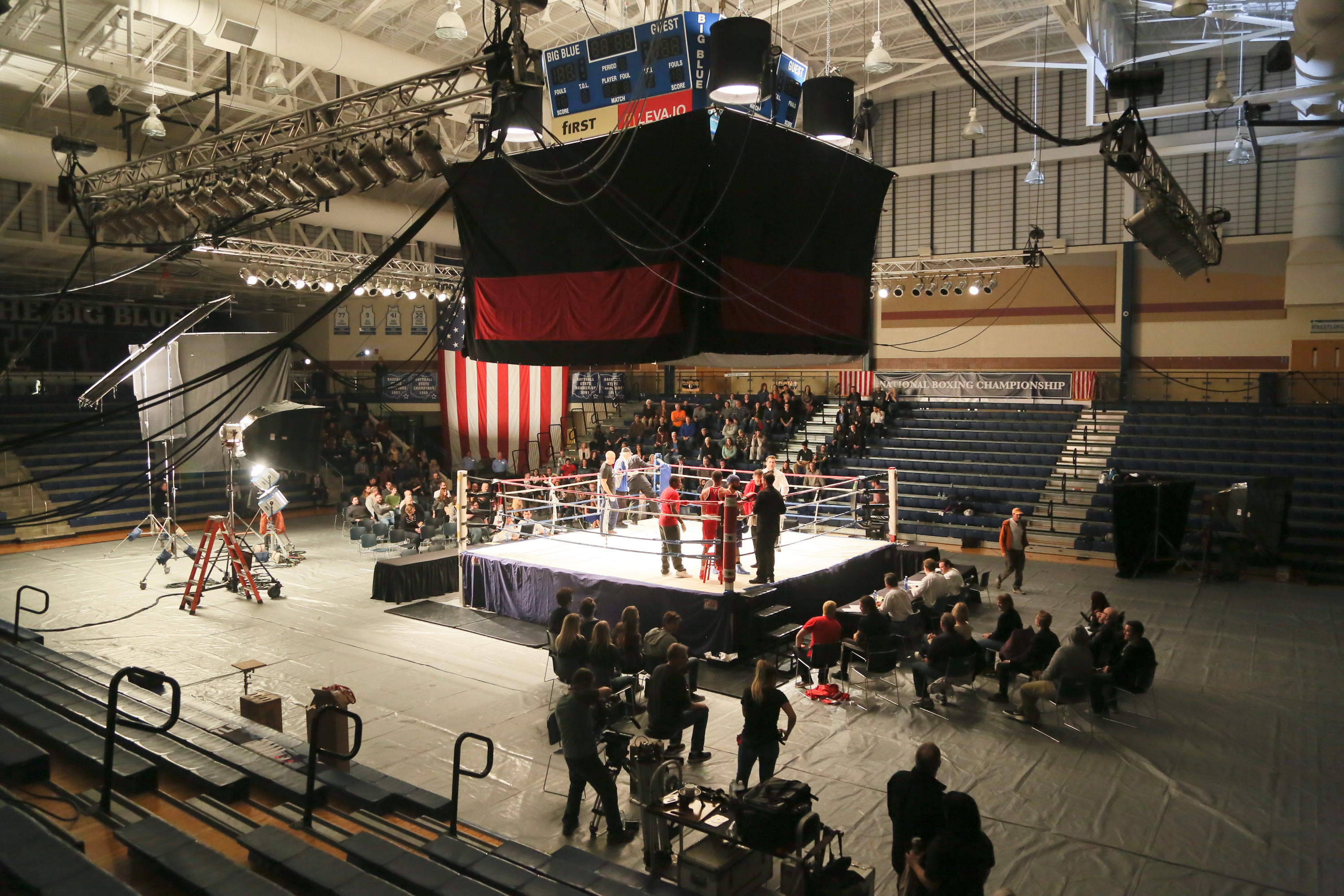 Actors Prem Singh and Michael Pugliese film a fight scene for the movie “Tiger” in the gymnasium at Hamilton High School.