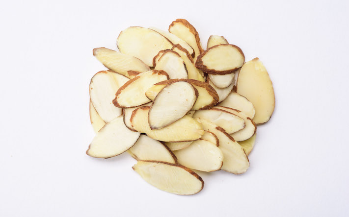FILE â Sliced almonds, in New York, Jan. 20, 2017. New milks made from everything from coconuts to almonds are allowing home cooks to create richer, more satisfying desserts. (Karsten Moran/The New York Times)