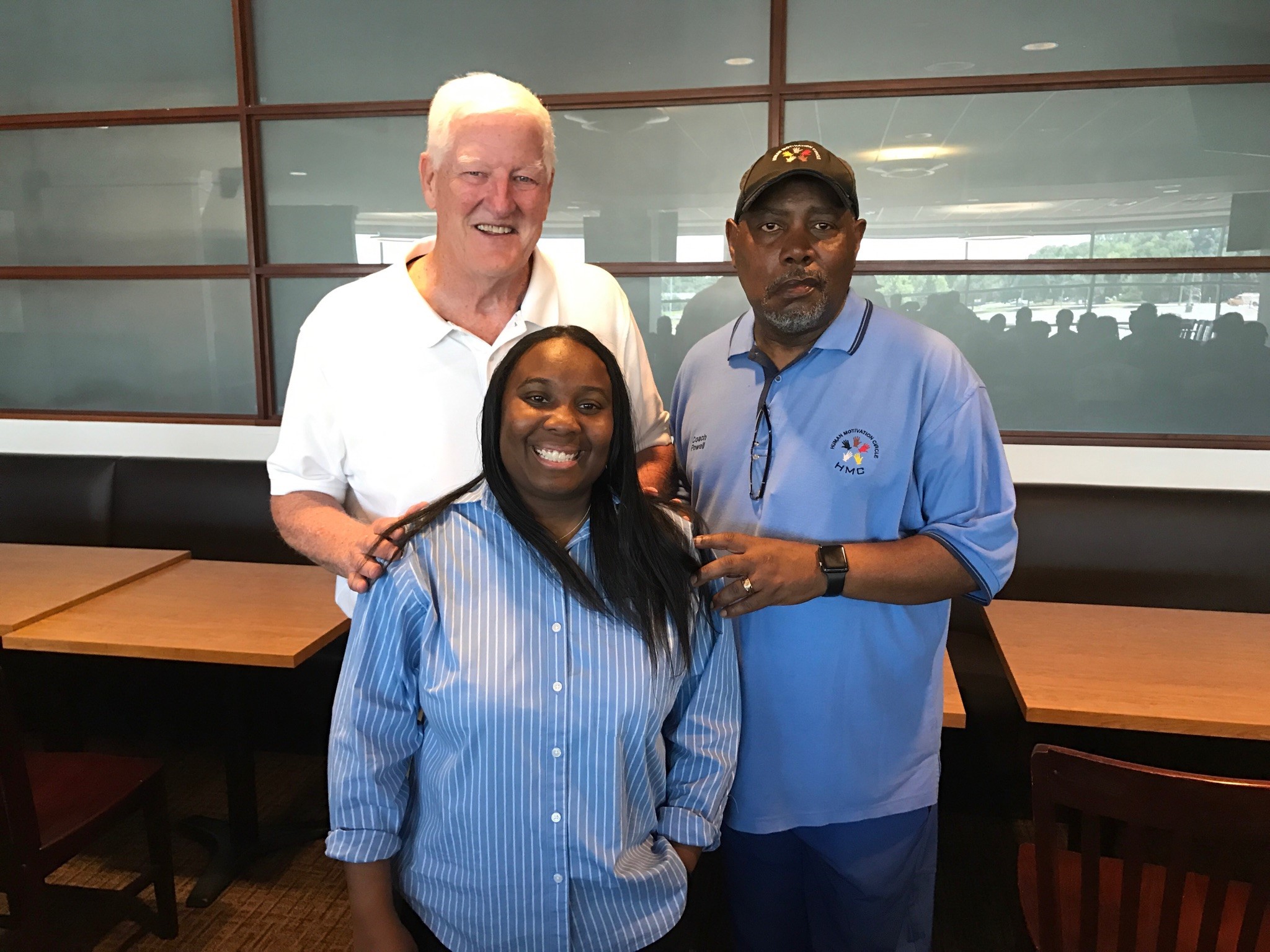 The Miami Valley coaching legends -- Jim Pace (left) and Al Powell (right) – who are the founders and ongoing co-chairs of the unique 7 on 7 Social Justice Football jamboree sponsored by the Miami Valley Football Coaches. With them is one of Tuesday’s keynote speakers, NaTasha Shabazz, a former college basketball player at Hiram College and a Bowling Green State University grad, who is a national speaker and an advisor to Lima City schools. (Photo by Tom Archdeacon)