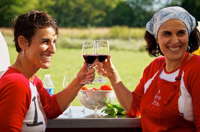 Elizabeth Corrado Weizman (left) and Gail Corrado Okafor (right) are sisters and the founders of Bella Sorella, a wood-fired pizza food truck in Dayton.