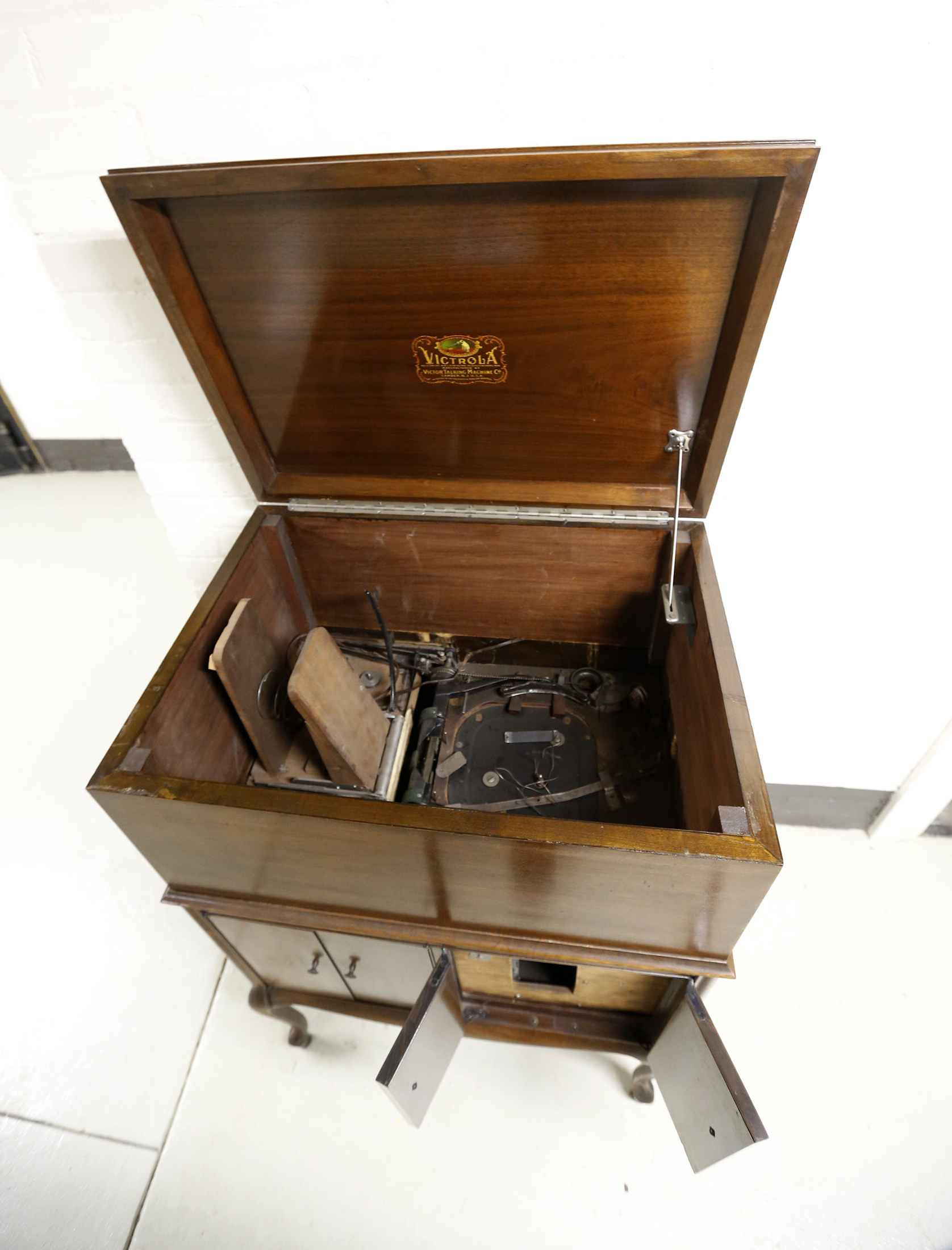 In the basement is a project the inventor never finished. Wright was attempting to convert a Victrola phonograph into a multi-record record player. If you peek inside you will see wood, wires and mechanisms left undone. LISA POWELL / STAFF