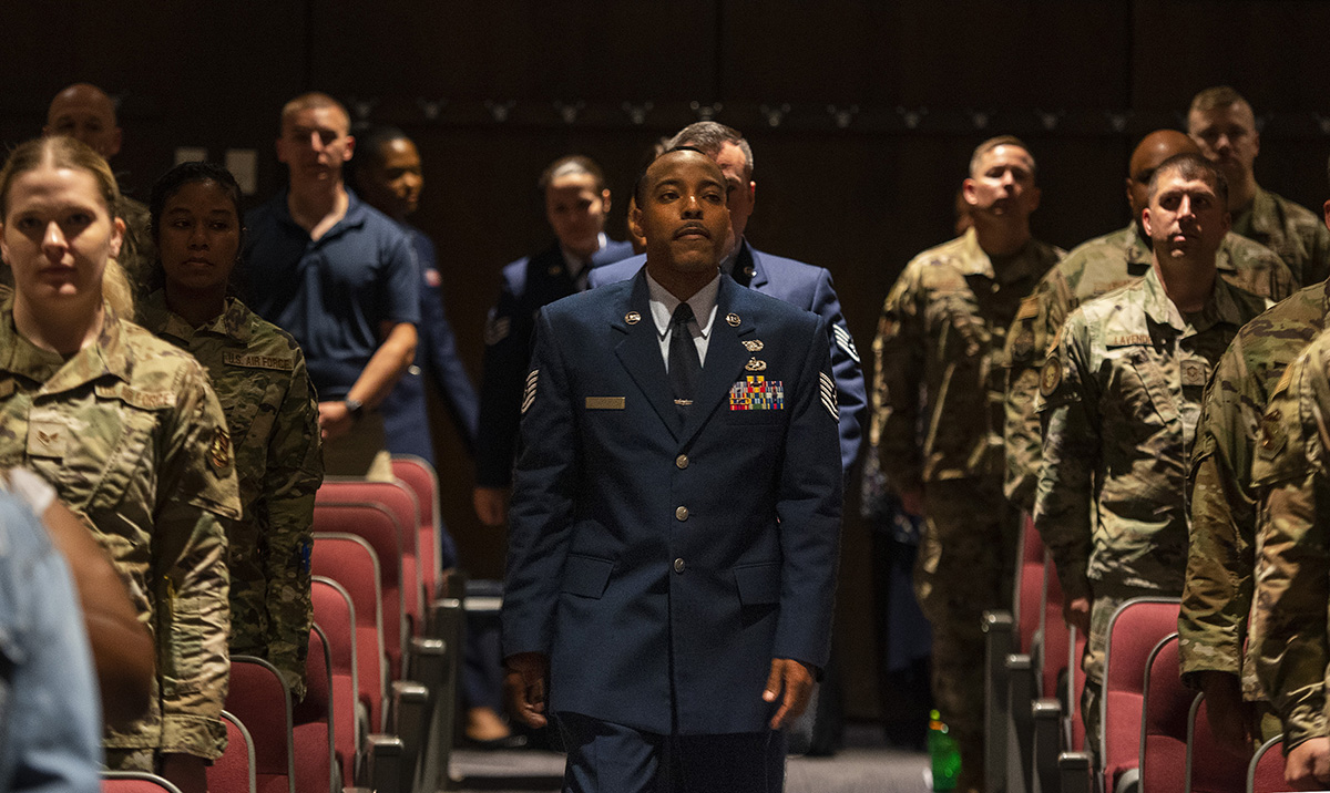 The Community College of the Air Force Wright-Patterson Class of 2022 marches into their graduation ceremony on June 15 at the National Museum of the Air Force. Forty Airmen earned associate degrees from the world’s largest community college system. U.S. AIR FORCE PHOTO/R.J. ORIEZ