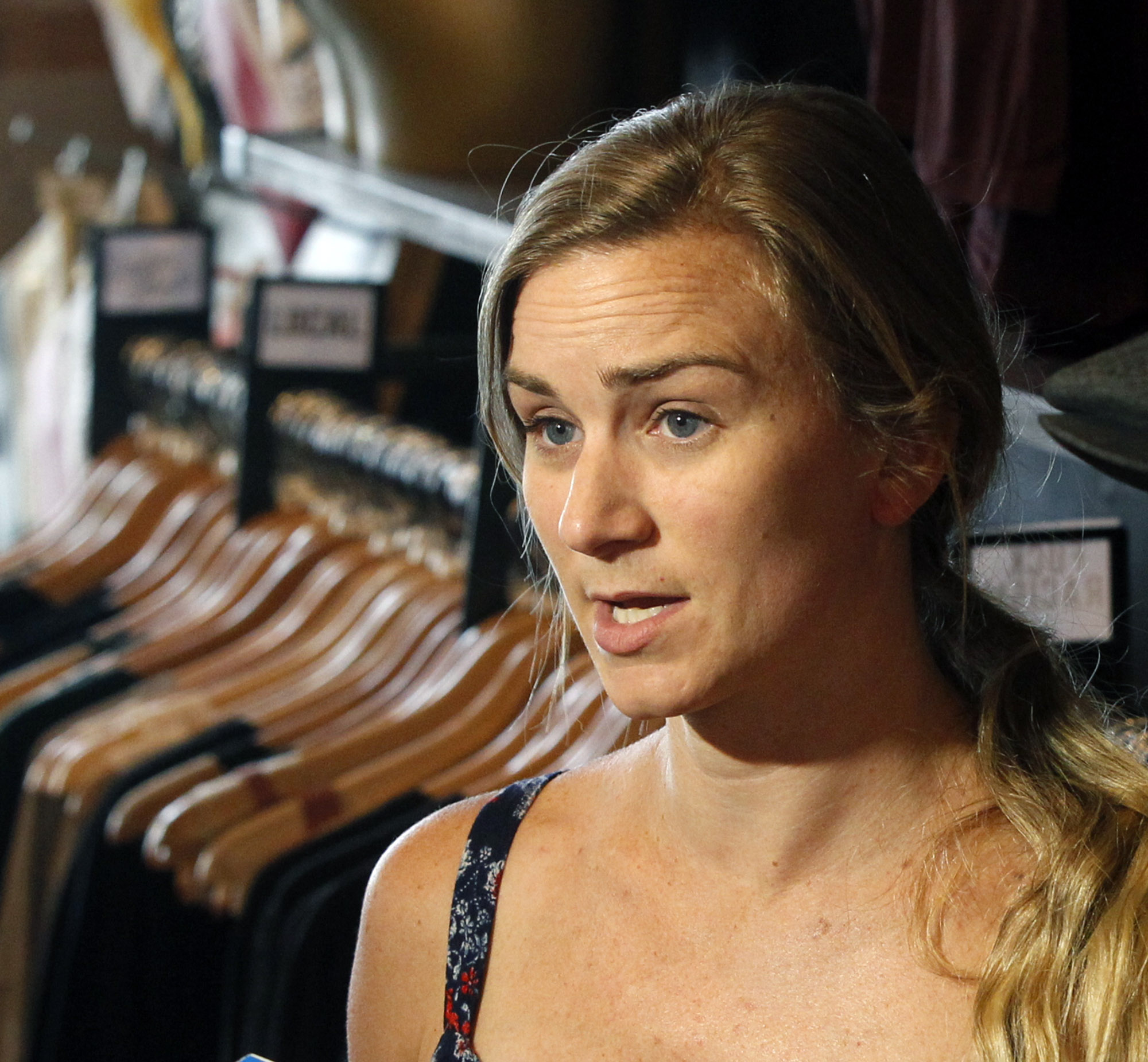 Heart Mercatile co-owner Amanda Hensler talks about the affects of the mass shooting in the Oregon District. TY GREENLEES / STAFF