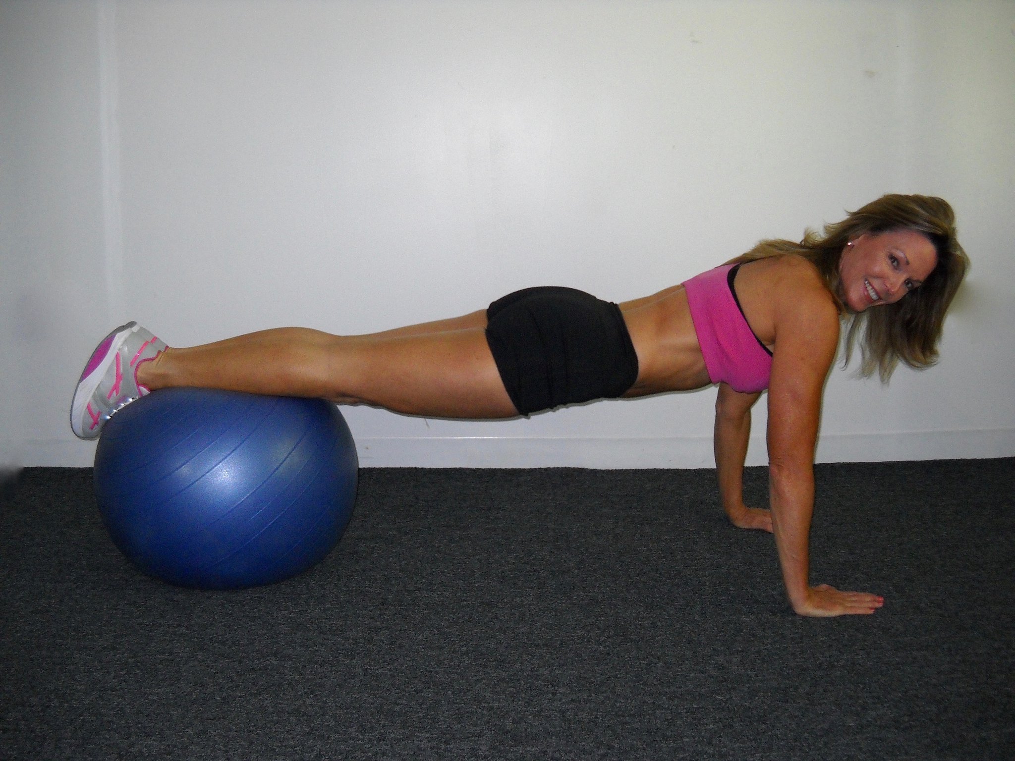 Marjie Gilliam, Dayton Daily News: Knee tucks with stability ball