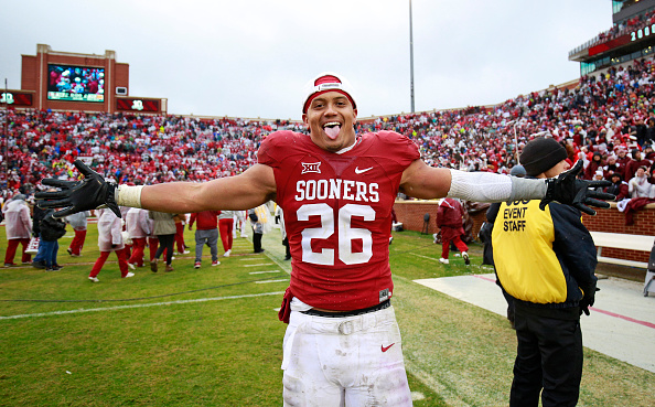NORMAN, OK - DECEMBER 3: Linebacker Jordan Evans #26 of the Oklahoma Sooners celebrates after the game against the Oklahoma Sooners December 3, 2016 at Gaylord Family-Oklahoma Memorial Stadium in Norman, Oklahoma. Oklahoma defeated Oklahoma State 38-20 to become Big XII champions. (Photo by Brett Deering/Getty Images)