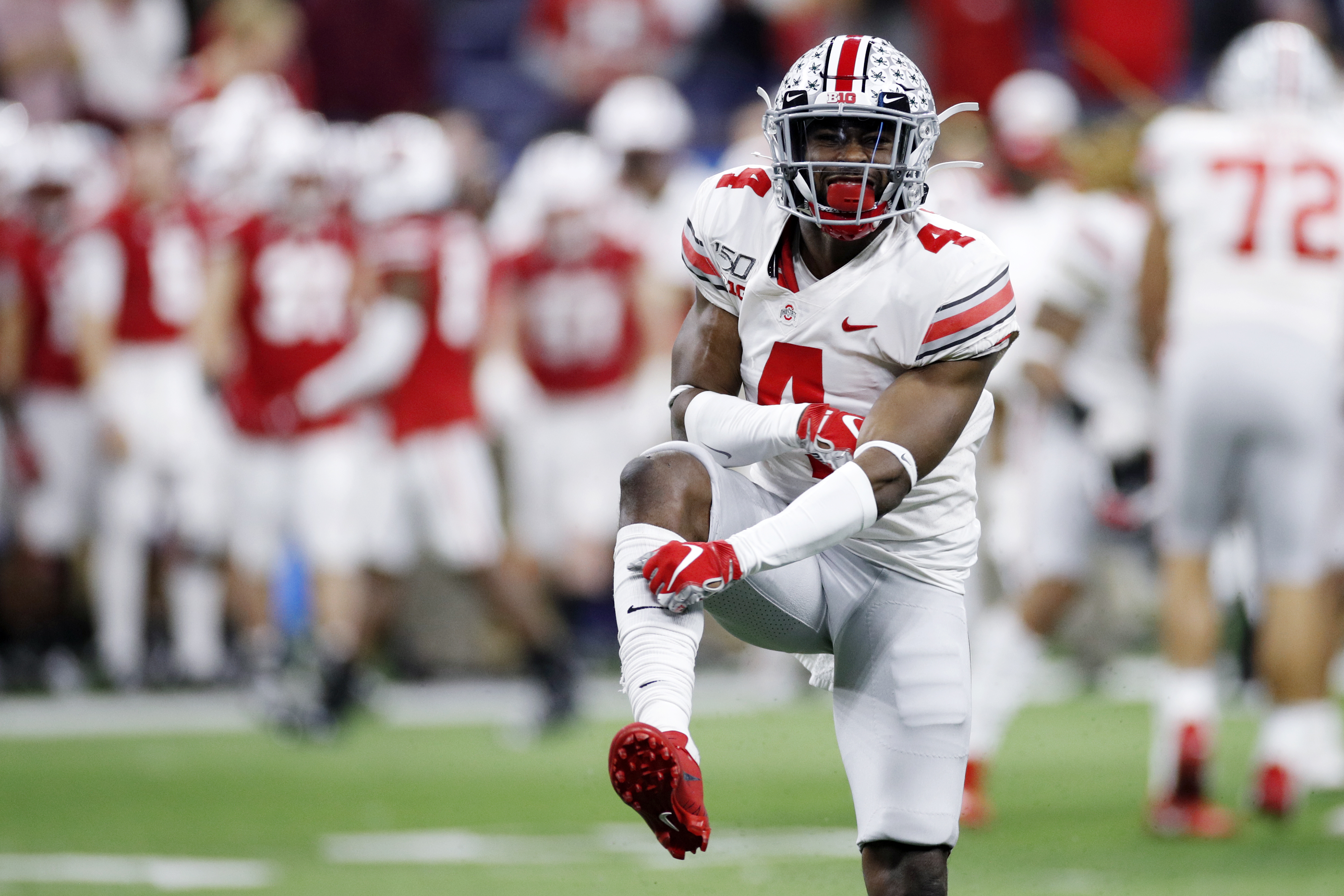 INDIANAPOLIS, IN - DECEMBER 07: Jordan Fuller #4 of the Ohio State Buckeyes celebrates in the fourth quarter against the Wisconsin Badgers during the Big Ten Football Championship at Lucas Oil Stadium on December 7, 2019 in Indianapolis, Indiana. Ohio State defeated Wisconsin 34-21. (Photo by Joe Robbins/Getty Images)