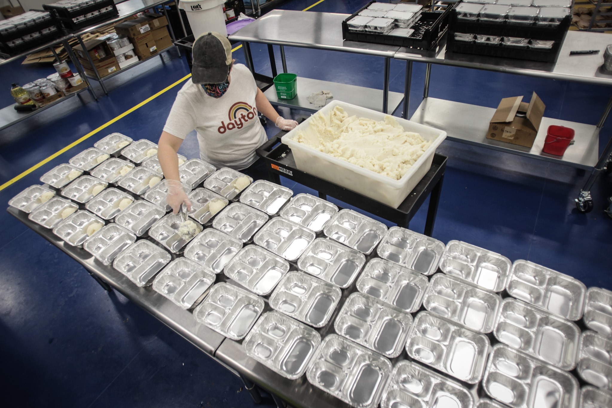 Jance Potter dishes up Thanksgiving meals at Daybreak in Dayton.
Daybreak in partnership with Miami Valley Meals work on 4000 Thanksgiving meals which will be distributed on Wednesday Nov. 25, 2020 at the University of Dayton and Trotwood Madison High School from 9am to 12pm.