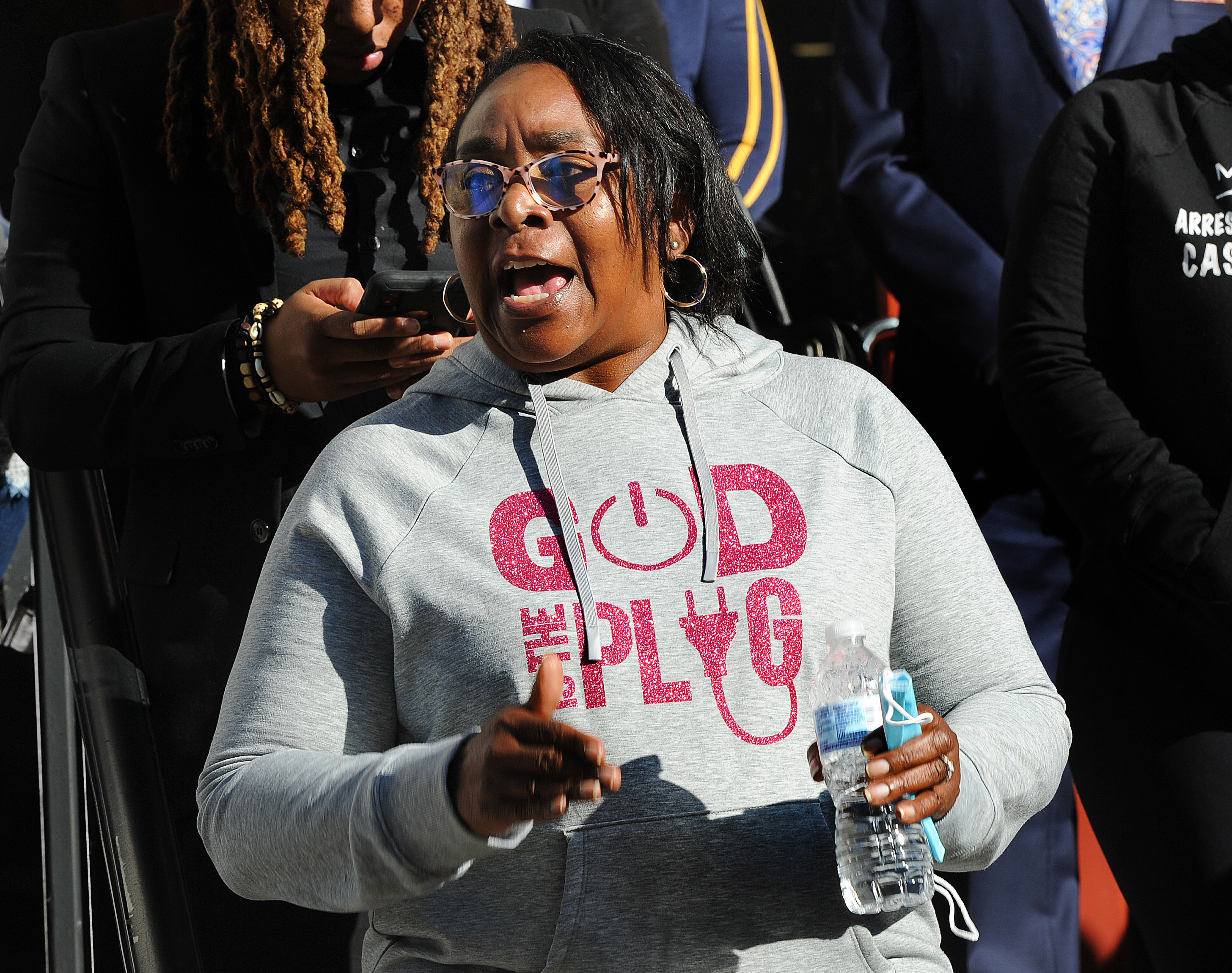Caroline Smith, the mother of Clifford Owensby, spoke to protesters outside Dayton City Hall on Wednesday, Oct. 13, 2021 demanding justice for her son. MARSHALL GORBY\STAFF