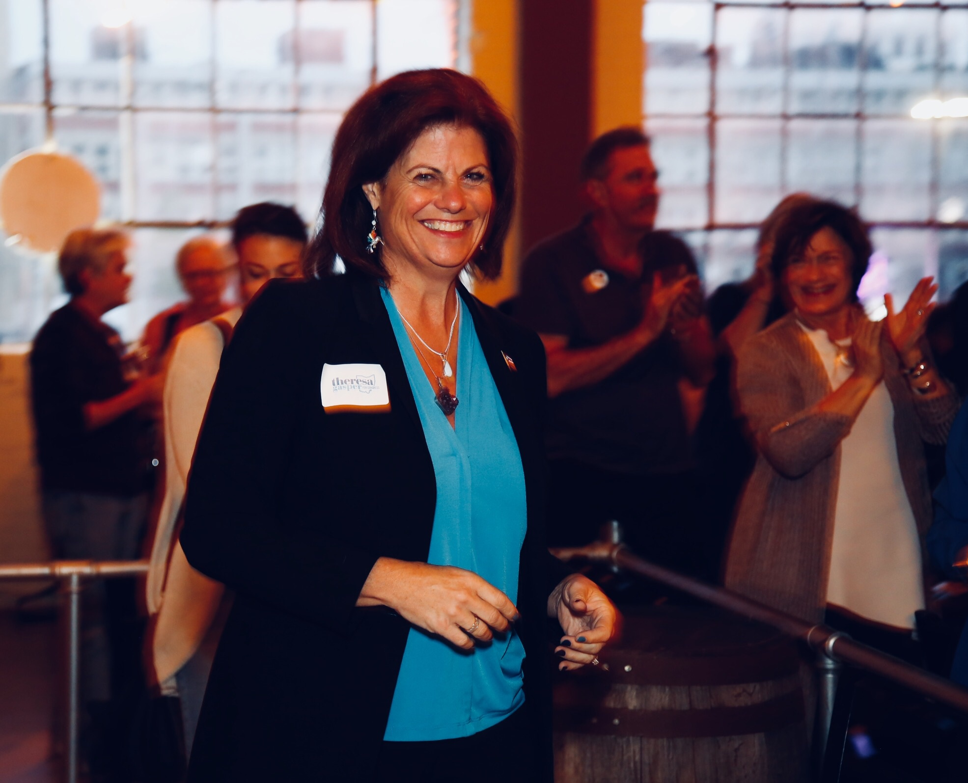Democratic candidate Theresa Gasper arrives at her election night party on Tuesday. Gasper is running in the primary for the 10th Congressional district against Michael Milisites and Robert Klepinger. TY GREENLEES / STAFF