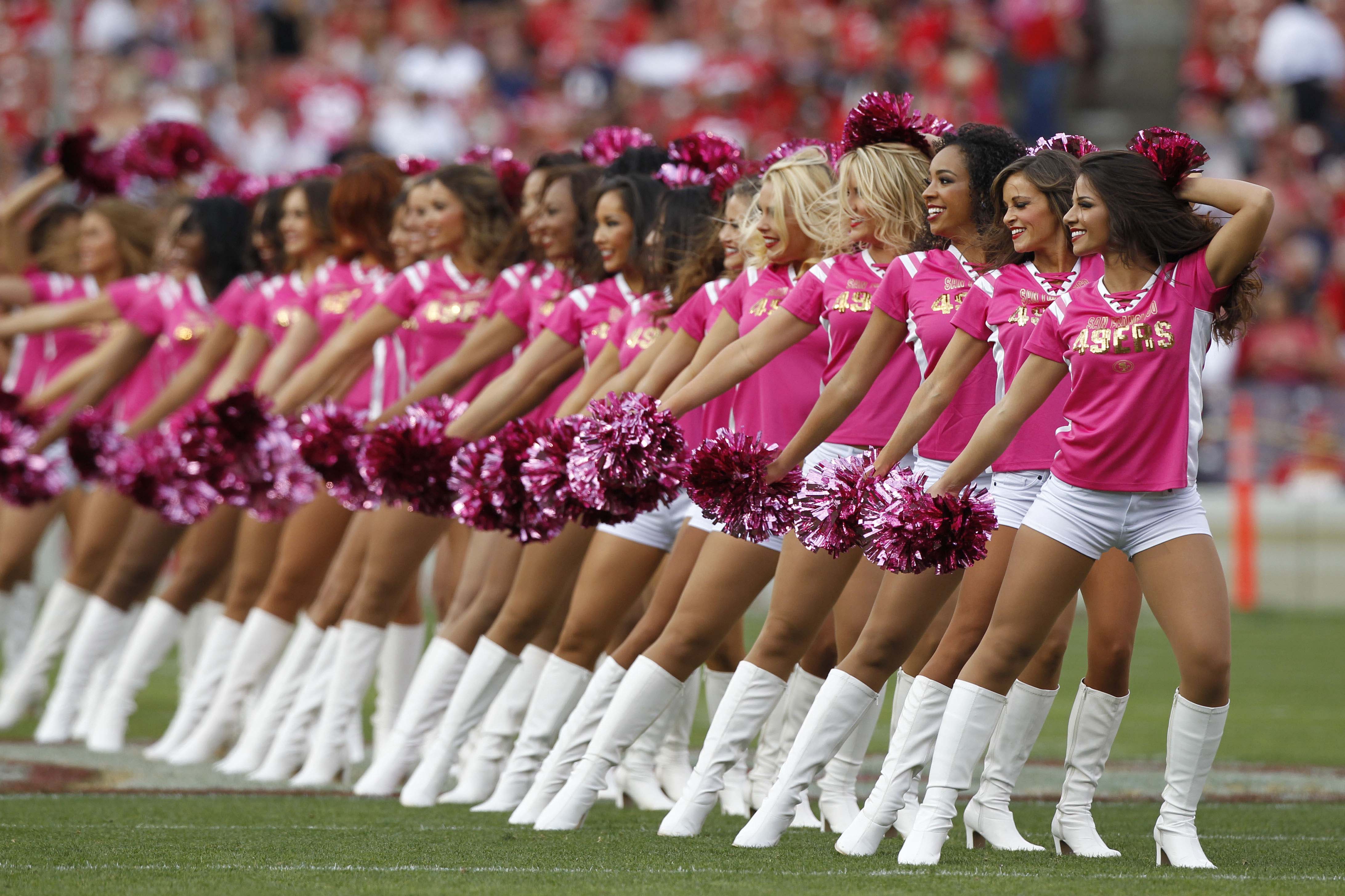 NFL cheerleaders think pink