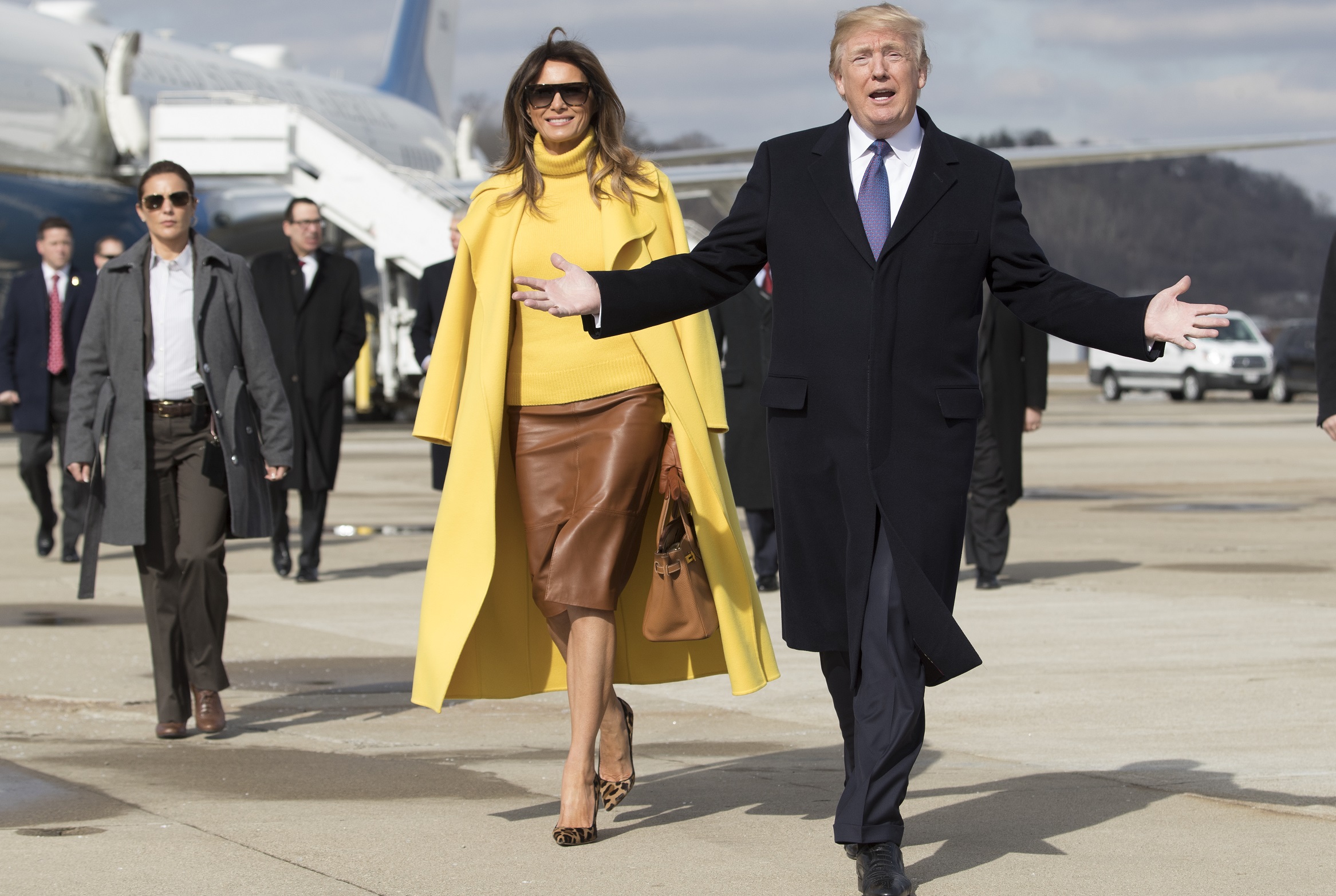 President Donald Trump and first lady Melania Trump arrive at Cincinnati Municipal Lunken Airport in Ohio, Feb. 5, 2018. The president is scheduled to speak about tax reform during a tour at the Sheffer Corporation in Ohio Monday, while the first lady will make a visit to the Cincinnati Children?s Hospital. (Tom Brenner/The New York Times)