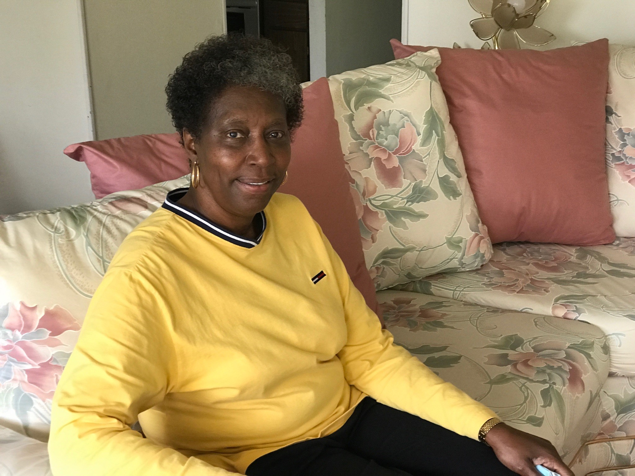Hazel Higgins sits in in the home she’s lived in on Weaver Street for 37 years. (Tom Archdeacon photo)