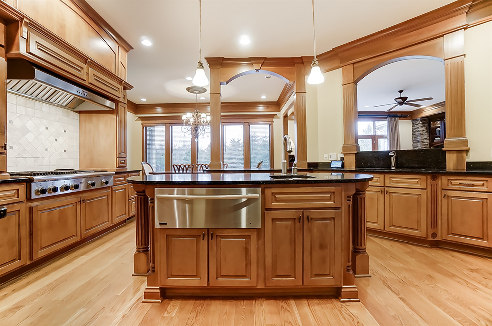 Maple cabinetry encircles the kitchen and offers storage space for nearly every cook’s needs. Quartz countertops provide breakfast bar seating and plenty of workspace, including a coffee station and an oval island with warming drawer. CONTRIBUTED PHOTO