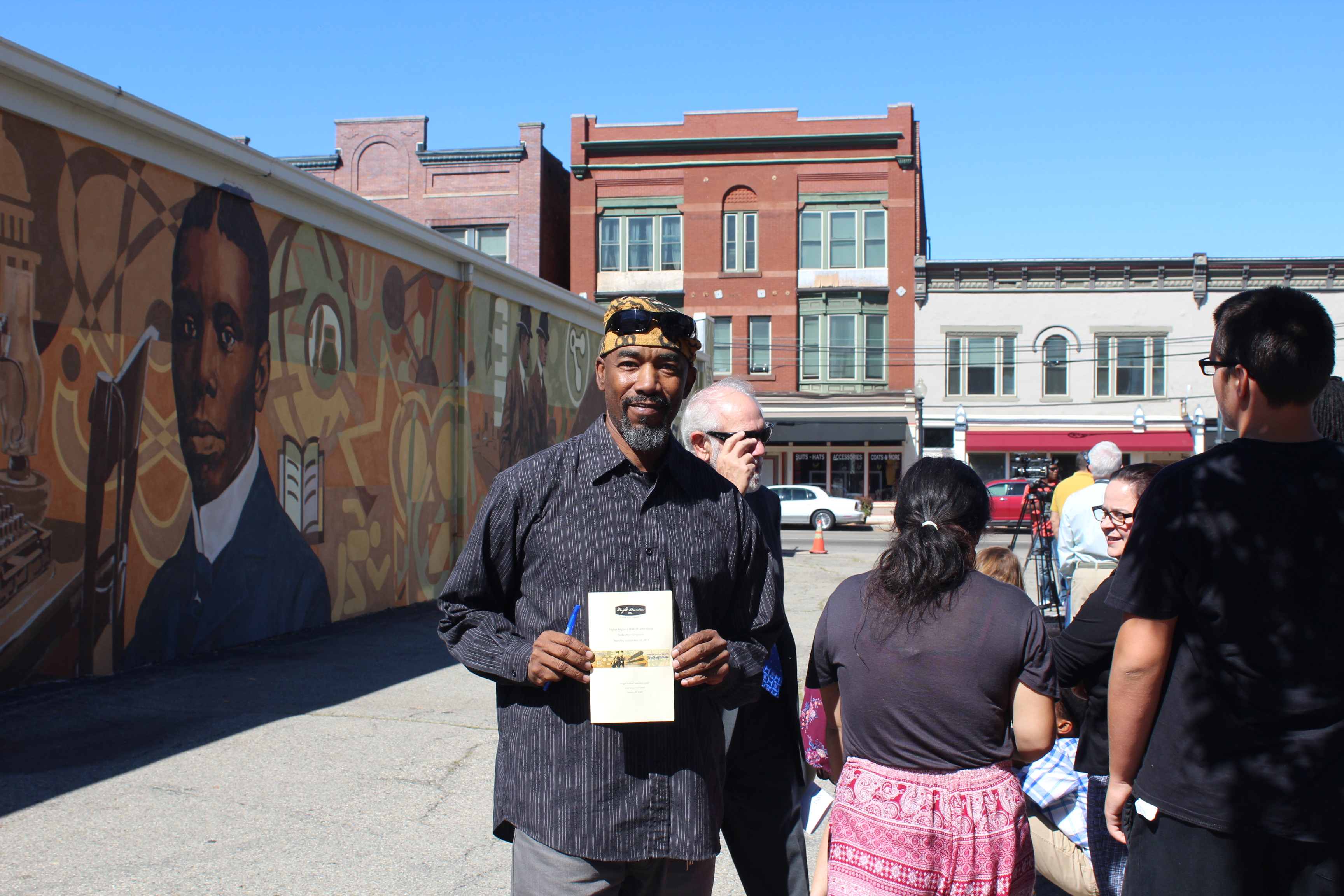 Photo from the dedication of the Dayton Region's Walk of Fame mural wall in Dayton Wright-Dunbar neighborhood. The mural was designed by Dayton artist James Pate. The dedication followed the 2017 walk of fame induction ceremony. Photo by Amelia Robinson