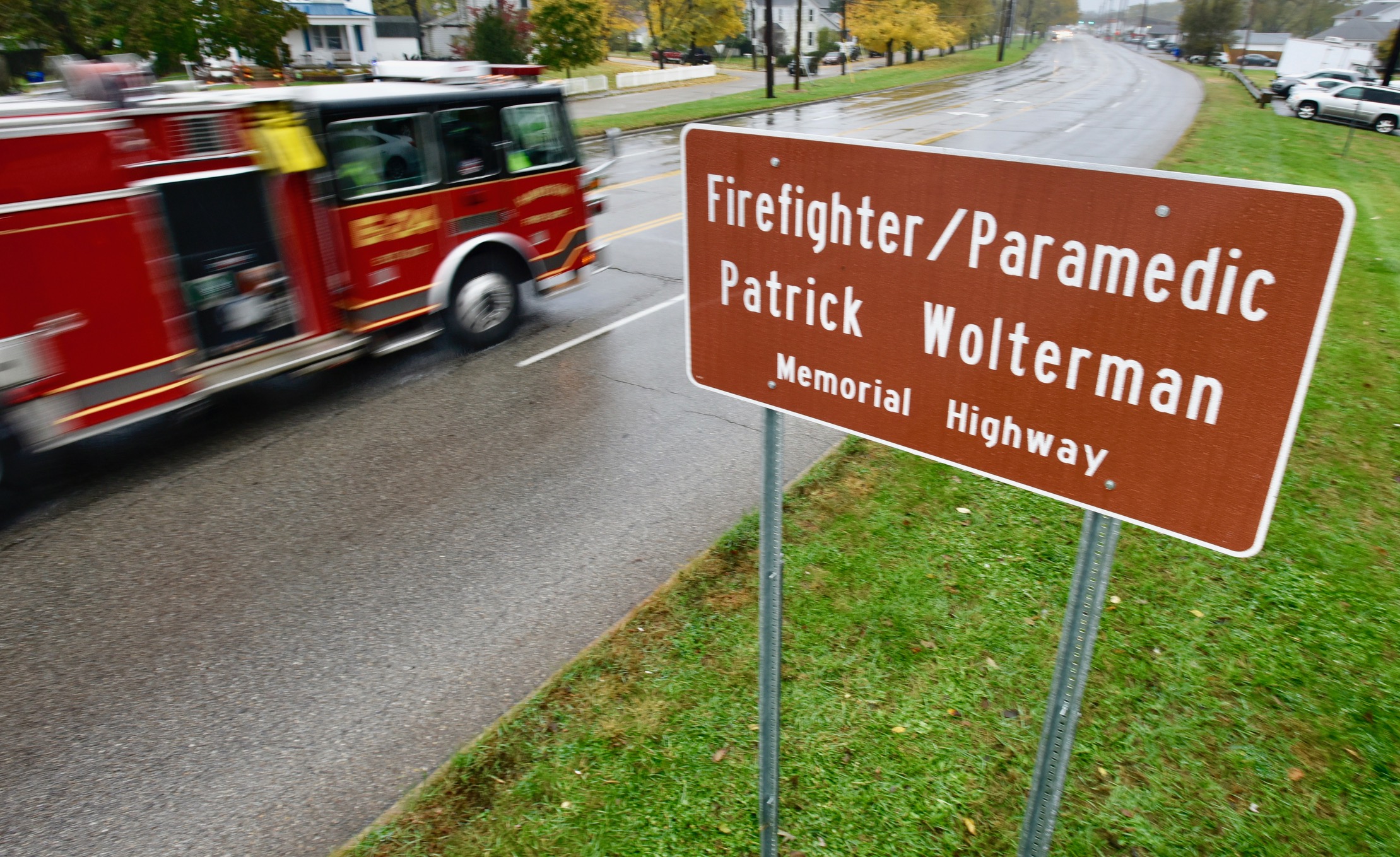 The new “Firefighter and Paramedic Patrick Wolterman Memorial Highway” sign at the stretch of road from North Fair Avenue to High Street in Hamilton.