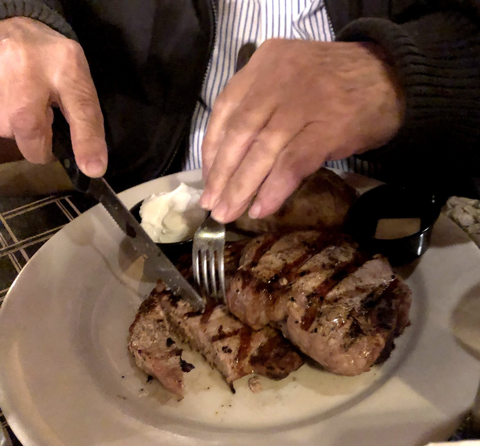 The Florentine Restaurant serves steaks, fish and chops. Pictured: two bone-in pork loin chops.