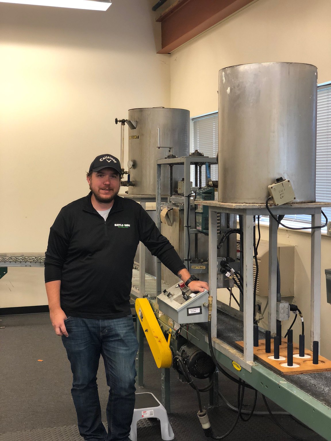 Nick Ripplinger, president of Battle Sight Technologies of Dayton, stands near the melting, mixing and pouring station at the company. Battle Sight manufactures the CrayTac, which is a pressure-activated chemiluminescent writing instrument used to communicate in low-light and no-light conditions. Ripplinger licensed the technology, which originated and was patented at Wright-Patterson Air Force Base and is marketing CrayTac it to the military, first responders and others.