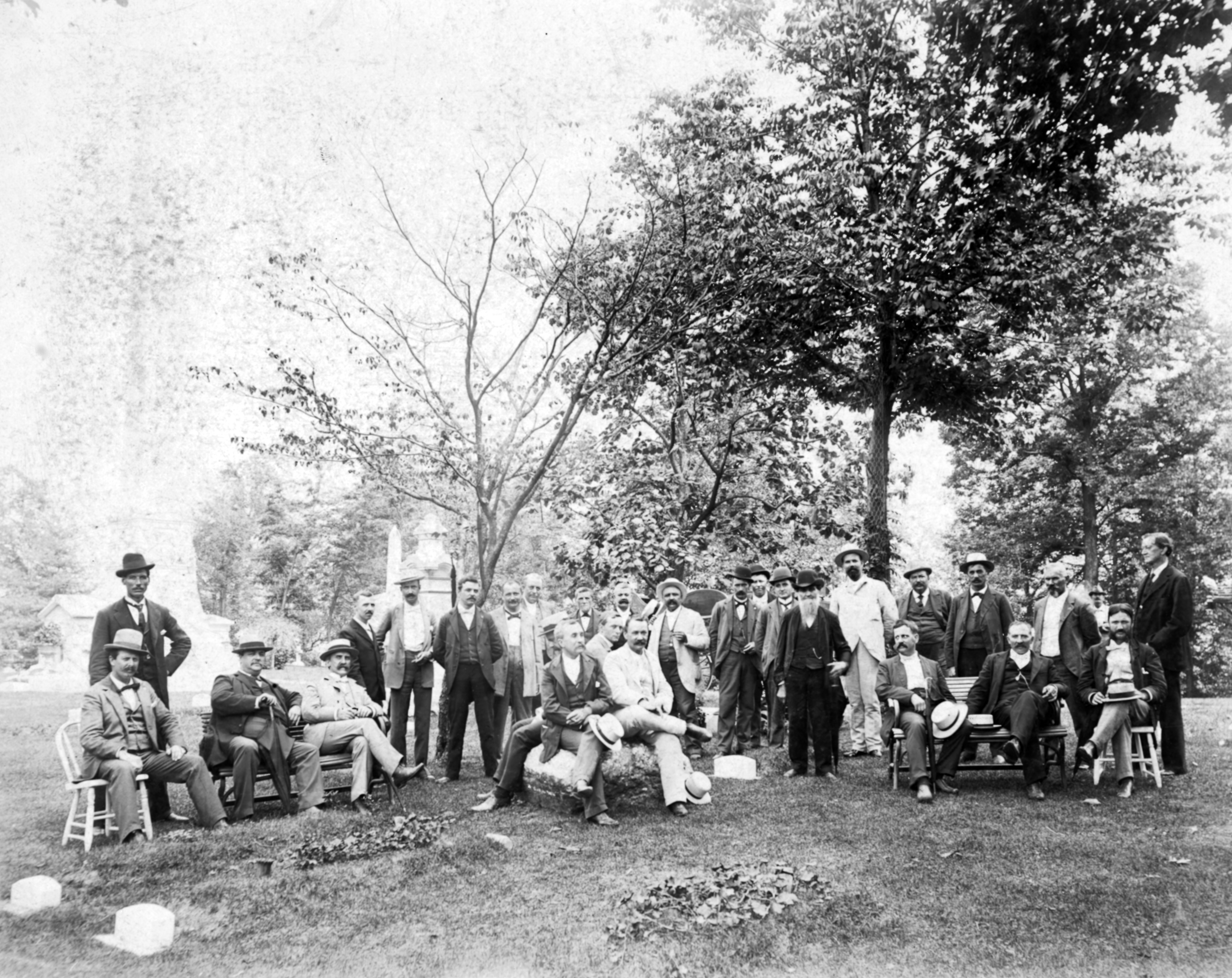 A group of men photographed in Woodland Cemetery in 1890. Family gatherings and picnics were popular in large park-like cemeteries. WRIGHT STATE UNIVERSITY SPECIAL COLLECTIONS AND ARCHIVE