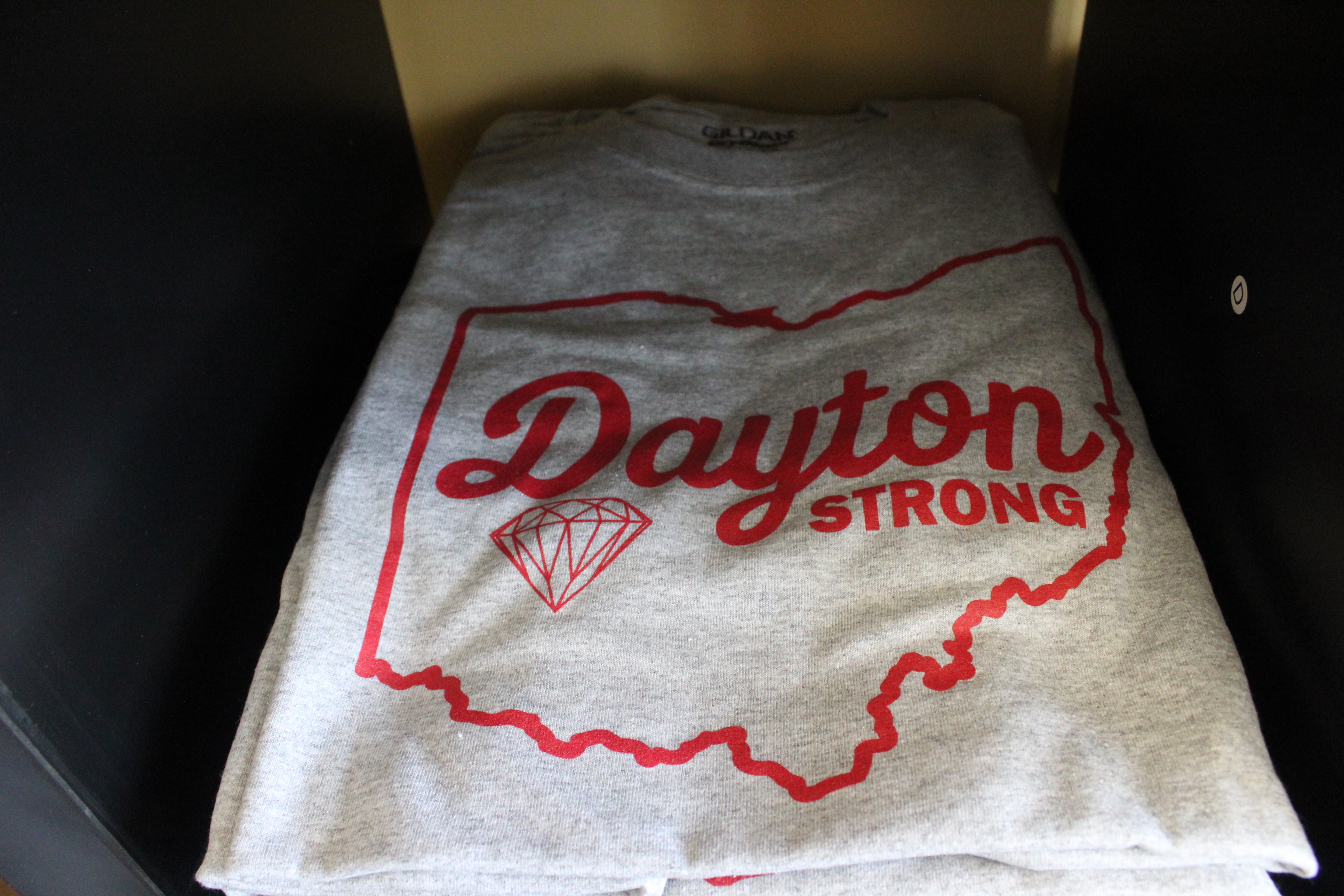 Chief Screen Printing owners Anthony Tomlinson and James Webster have raised nearly $5,500 through the sale of Dayton Strong T-shirts.