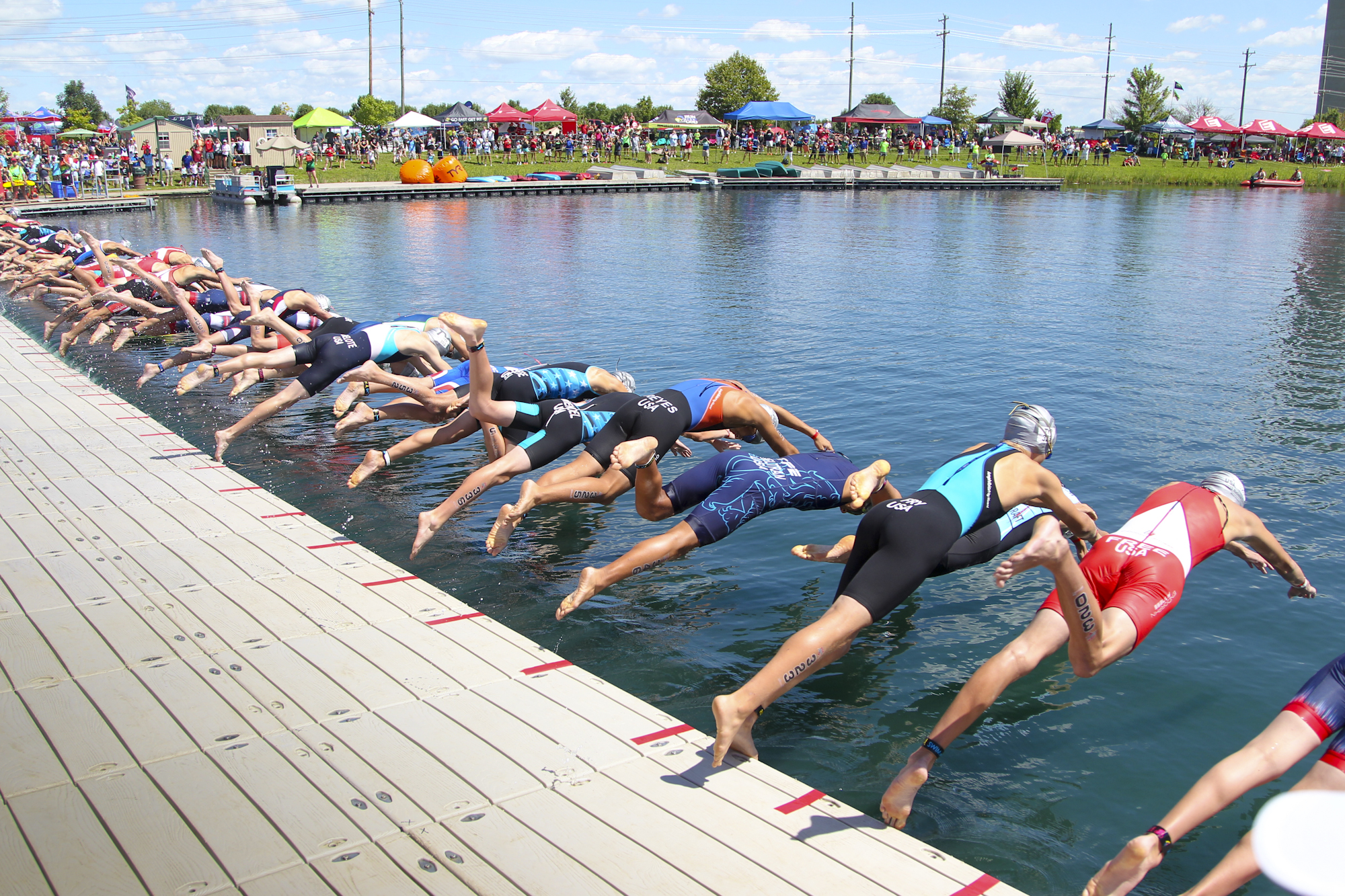 The Voice of America MetroPark in West Chester Twp. hosts many events, including the USA Triathlon Youth and Junior National Championship, pictured here in 2015. The county park system is seeking to make improvements with the help of 2020 state capital funds, including at its West Chester Twp. park. GREG LYNCH/FILE