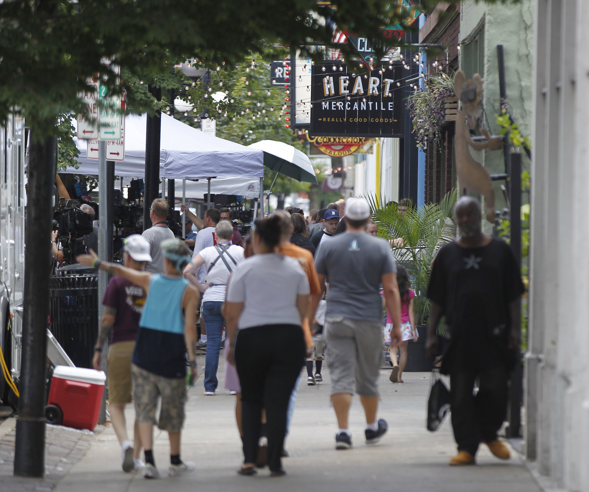 The Oregon District was busy on Monday after a mass shooting early Sunday morning left shop, restaurant and bar owners and residents shocked. TY GREENLEES / STAFF