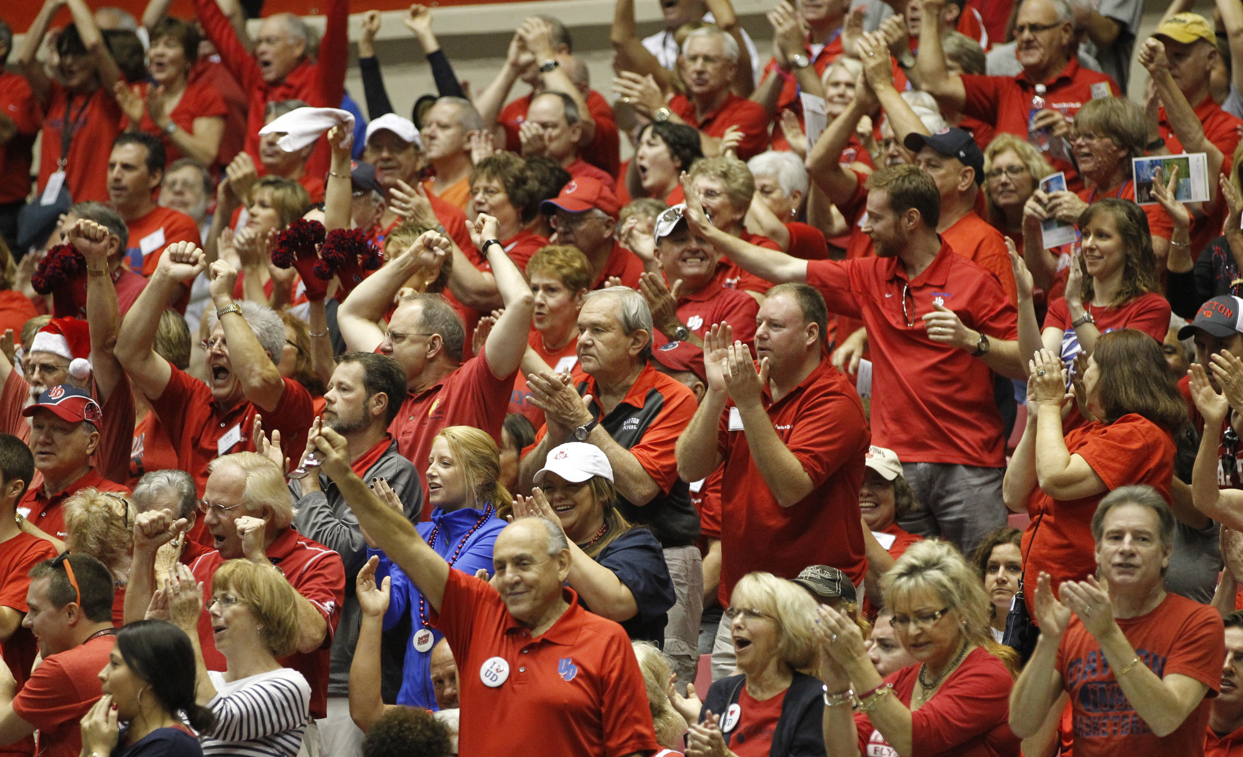 Dayton fans cheer during a game against Texas A&M in the first round of the Puerto Rico Tip-Off on Thursday, Nov. 20, 2014, at Coliseo Roberto Clemente in San Juan, P.R. David Jablonski/Staff