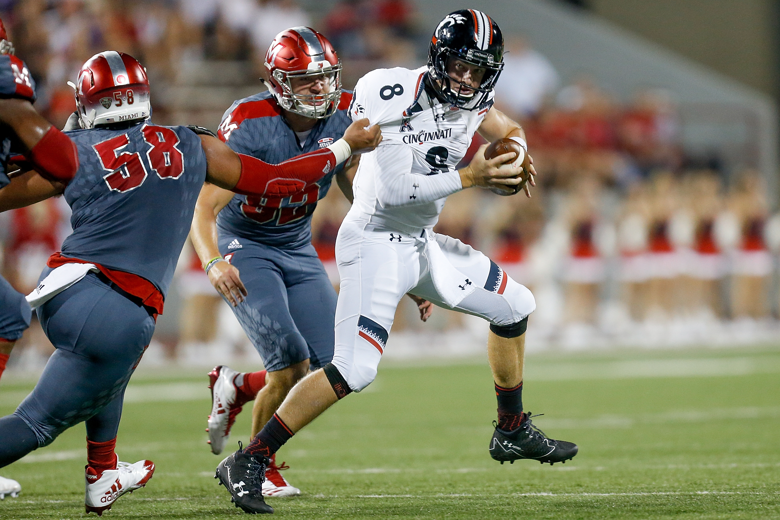 UC football scores 31 straight points to beat Miami's RedHawks