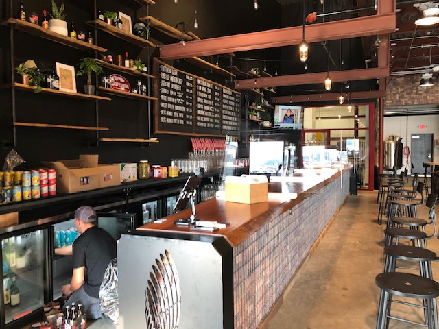 Dayton-based Warped Wing Brewing Co. will open its ambitious new second location, The Warped Wing Barrel Room & Smokery, to the public on Saturday, Aug. 29, in Springboro. MARK FISHER/STAFF
The 20,000-square-foot facility at the crossroads of Springboro at State Routes 73 and 741 will house a tap room, a restaurant, an outdoor biergarten-style patio, a large space for barrel-aging beers, a test-pilot brewery, a distribution hub and event space