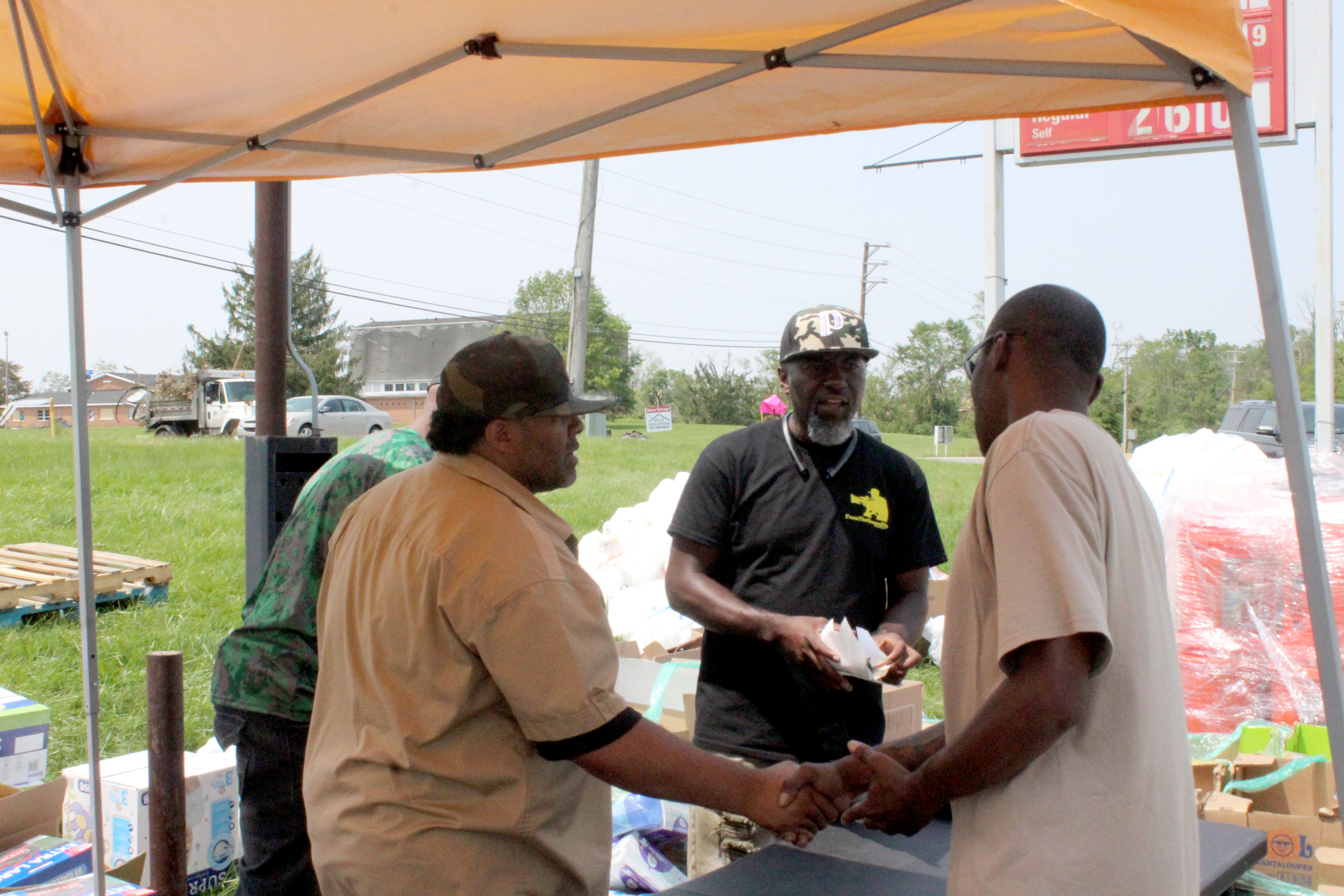 A donation center was set up following last week's tornadoes at Pippin’s Market in Trotwood. Needed items include cleaning supplies, deodorant, body wash and baby items like diapers, wipes, baby food and formula. Organizer Sylvester Darnell (center) is pictured.