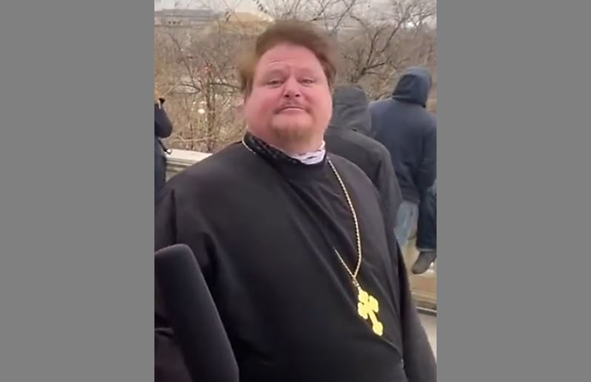 The Rev. Mark Hodges, an Orthodox priest from Lima, was suspended from the priesthood after joining in the protest Jan. 6 at the U.S. Capitol, where he is seen in this still image taken from video posted to social media.