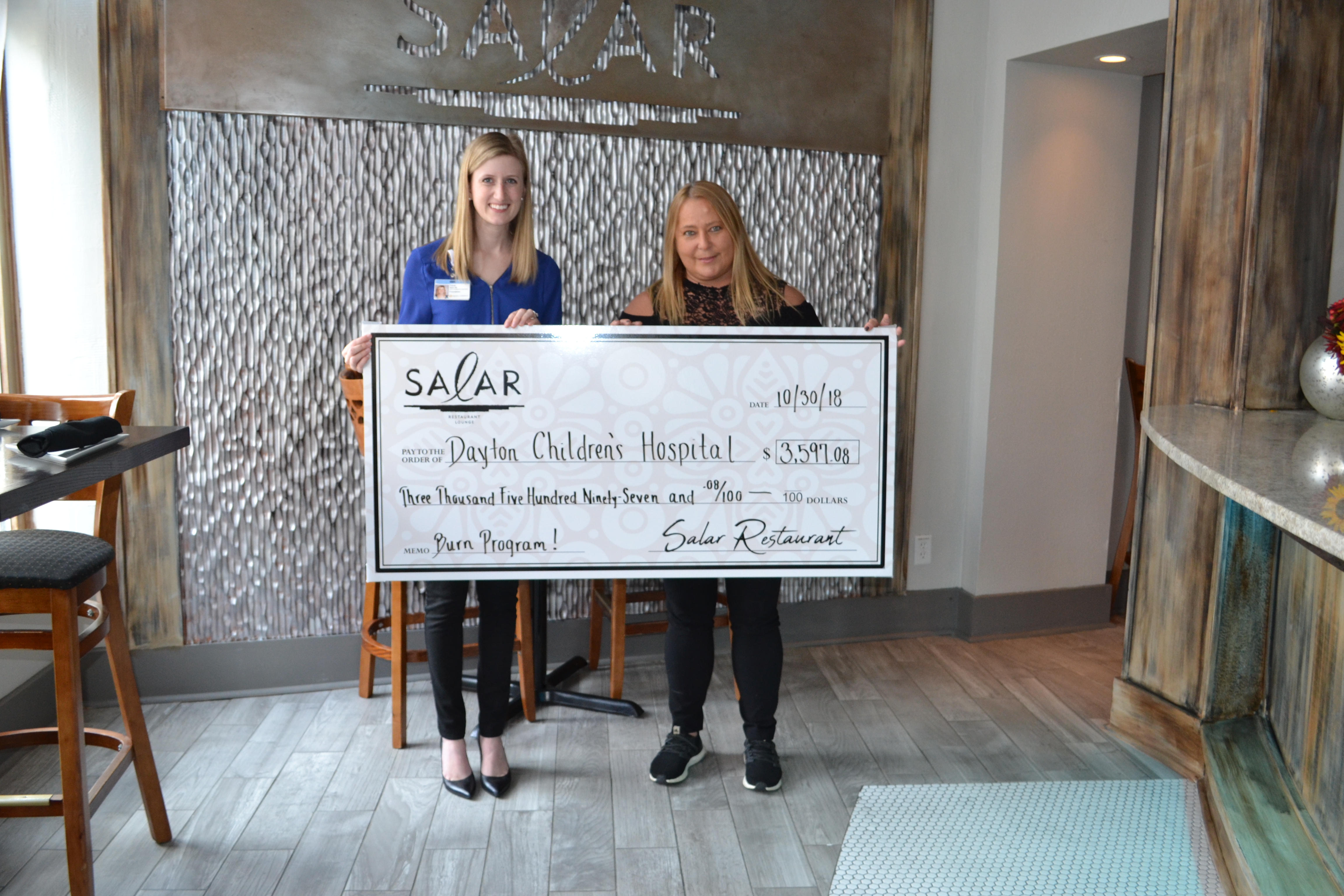 Salar Restaurant and Lounge, 400 E. Fifth St. in Dayton’s Oregon District, has donated $3,600 to Dayton Children’s Hospital Burn Program.
