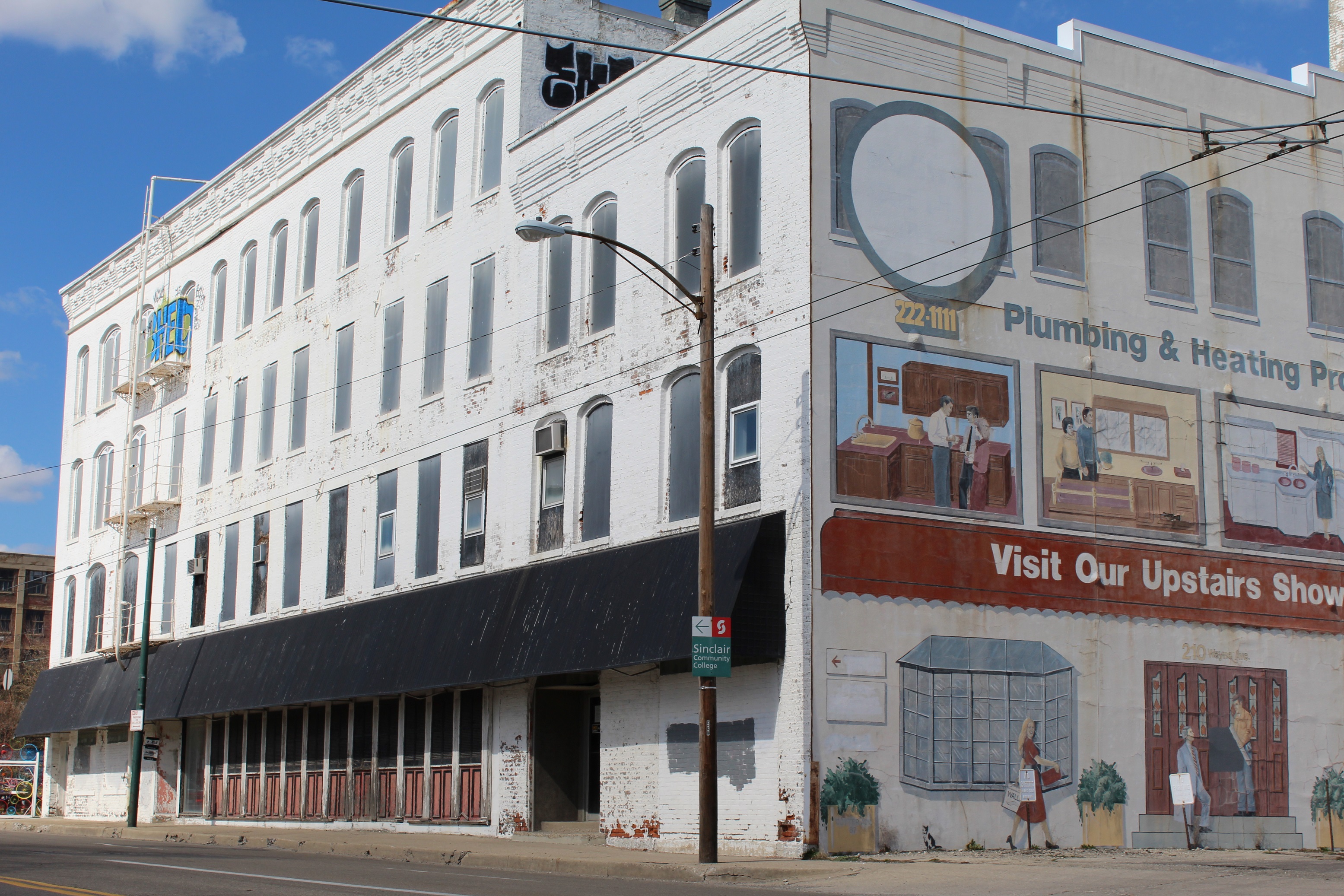 The empty industrial building at 210 Wayne Ave. is being turned into 40-style loft apartments, and a restaurant is moving into a ground floor space. CORNELIUS FROLIK / STAFF