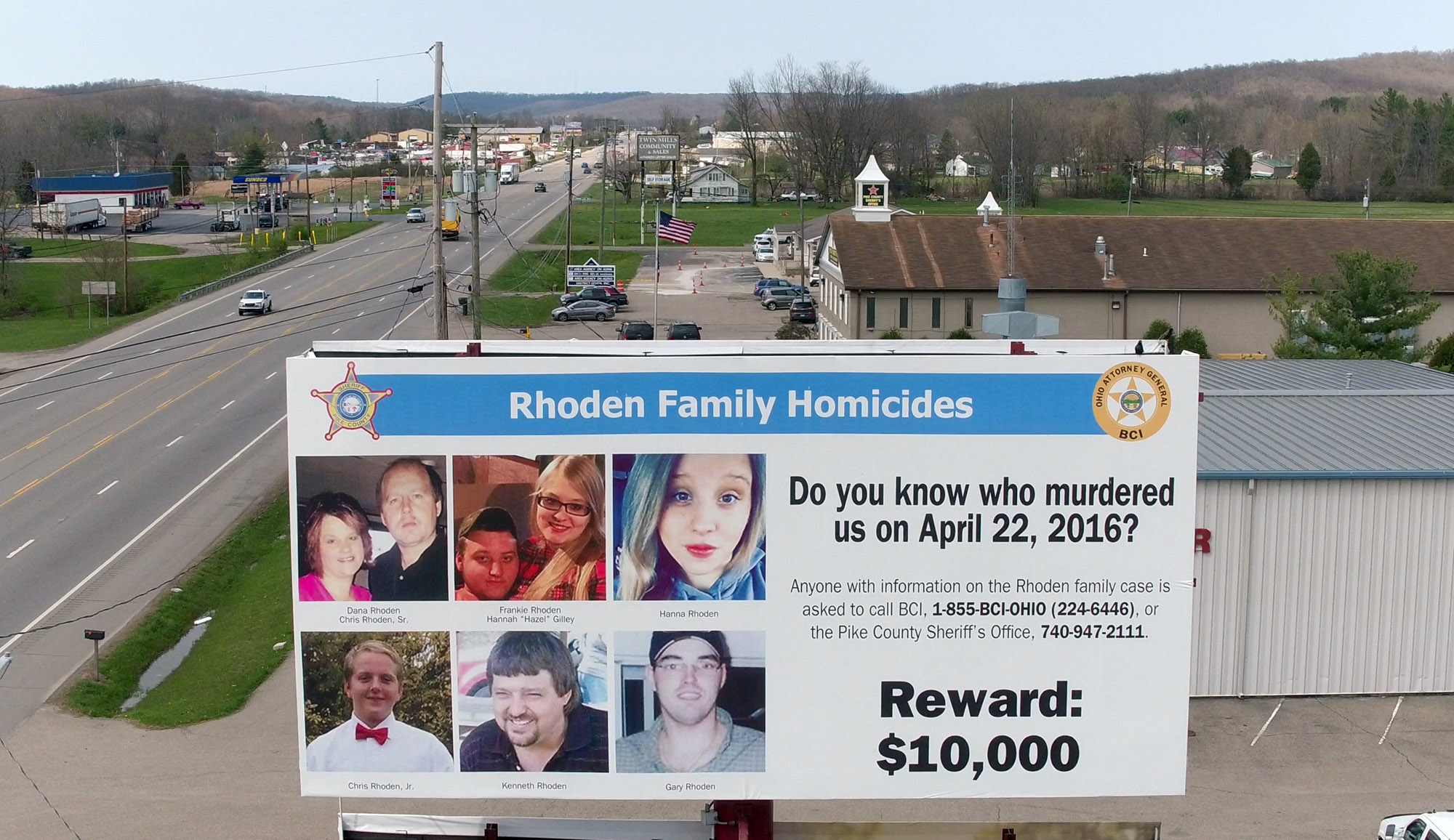 A billboard seeking information remains posted 300 feet from the Pike County Sheriff's Office two years after the murder of 8 Rhoden family members in rural Pike County. The crime remains unsolved. TY GREENLEES / STAFF