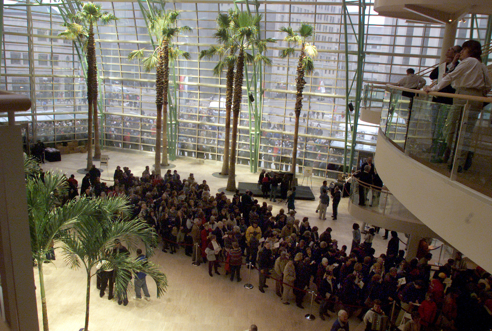 03/01/03 A massive line of people, waiting to get in, wraps around and into the front entrance of the Schuster Performing Arts Center for the public grand opening on Sunday afternoon.
