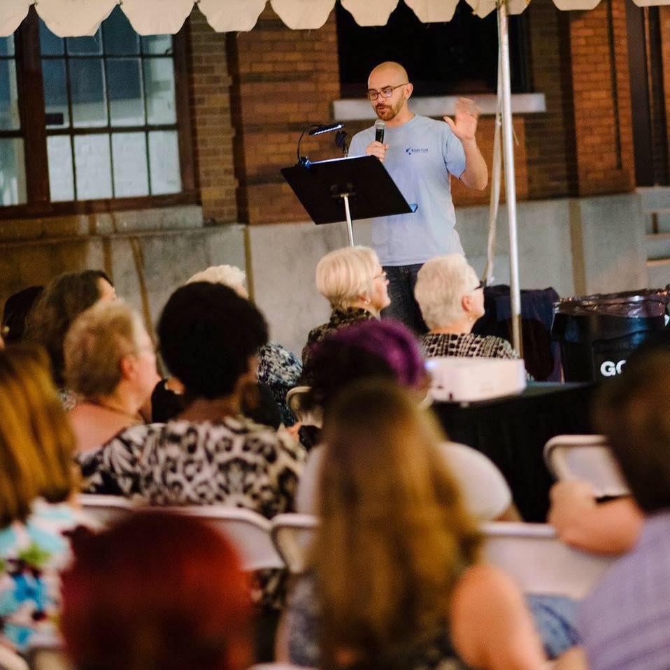 Arch Grieve, a mediation specialist at the Dayton Mediation Center, is the new chair of the Dayton Sister City Committee and is vice president of the Dayton Council on World Affairs. He is pictured giving a talk for PechaKucha Dayton.