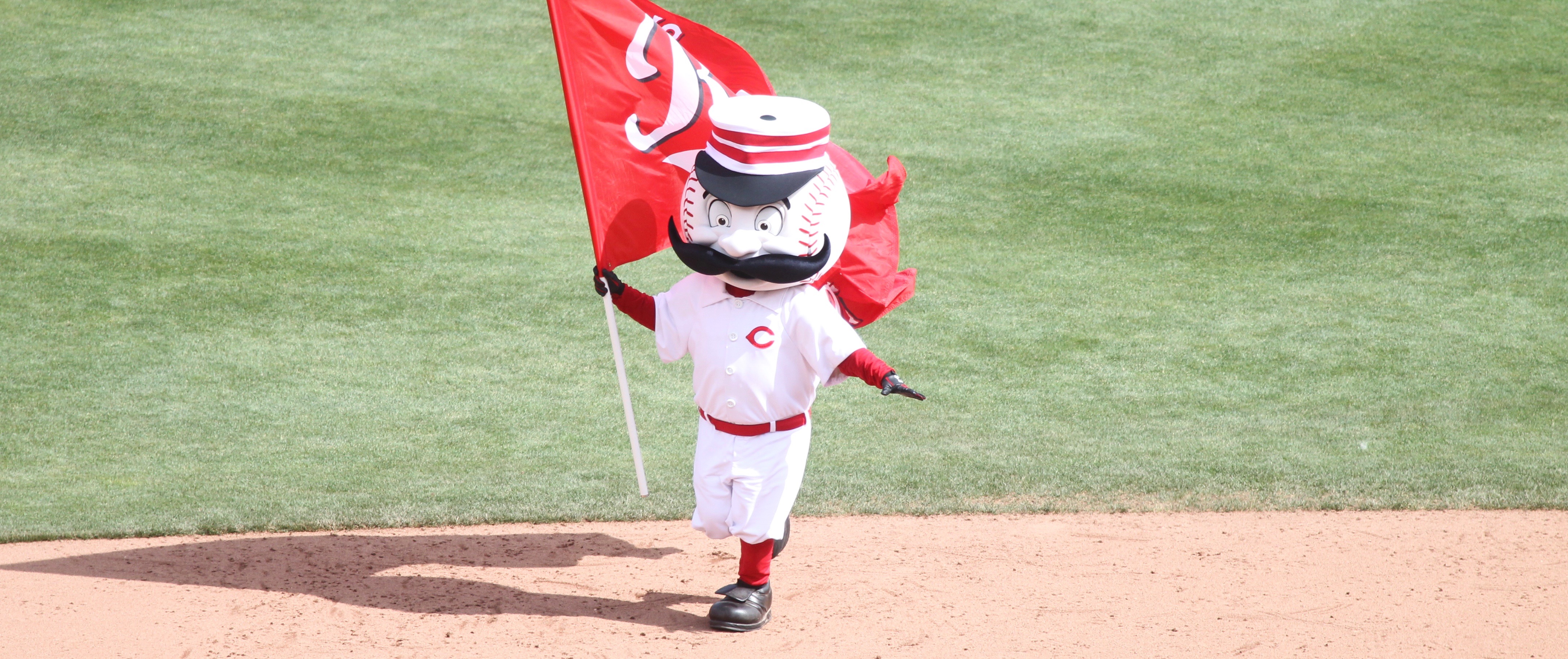 Cincinnati Reds mascot Mr Redlegs runs with a flag after the game News  Photo - Getty Images