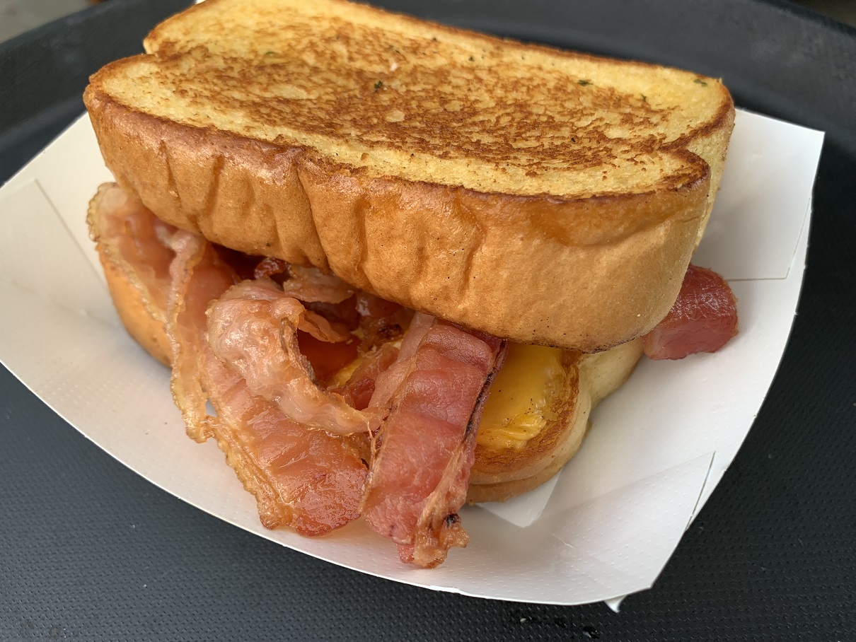 Delicious dishes served at Bacon Fest at Kettering Fraze Pavilion on Saturday, Aug. 28, included pulled pork bacon nachos, bacon banana cream pudding, bacon wrapped turkey legs and Cuban sandwiches. CONTRIBUTED/ALEXIS LARSEN