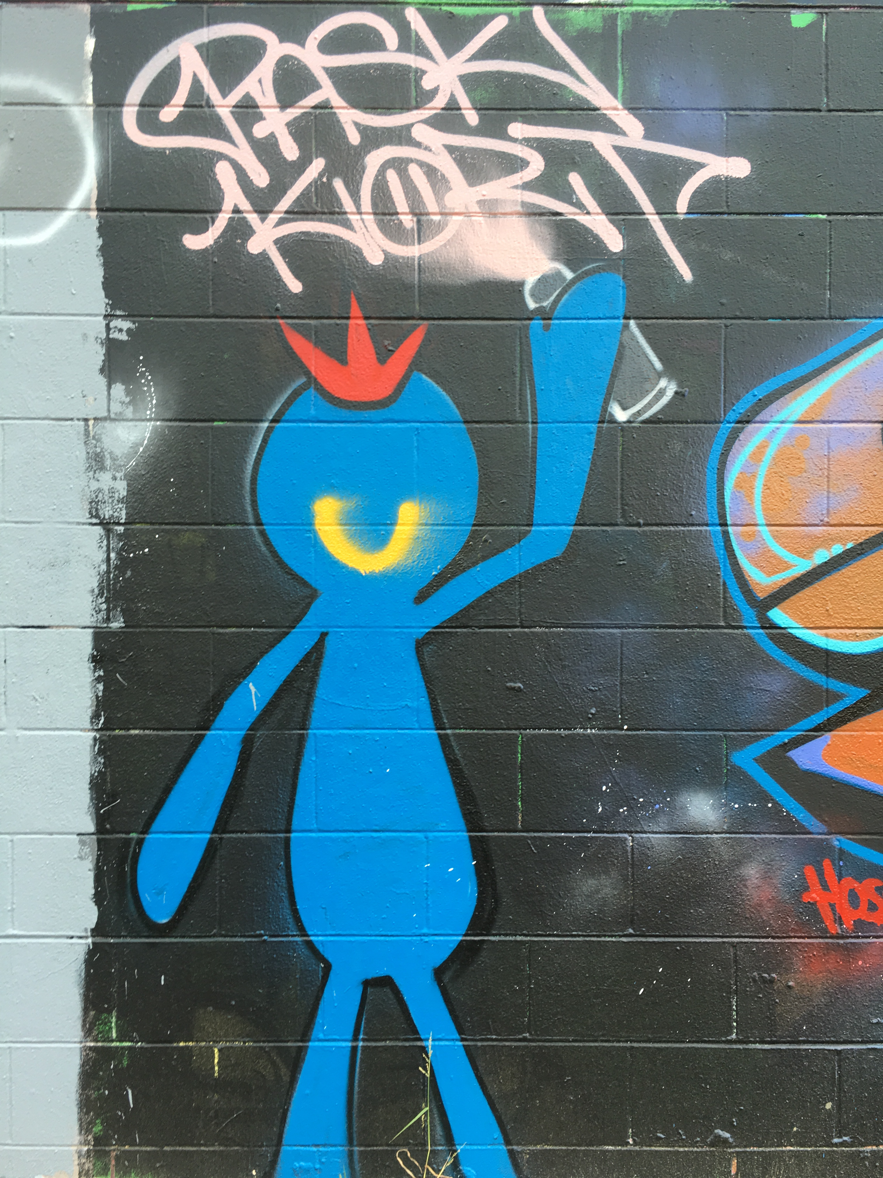 There's a mural of characters from the popular Adult Swim show 'Rick and Morty' on the wall of Stop-N-Lock on 3636 Linden Ave. in Dayton. ALLEGRA CZERWINSKI / STAFF PHOTO