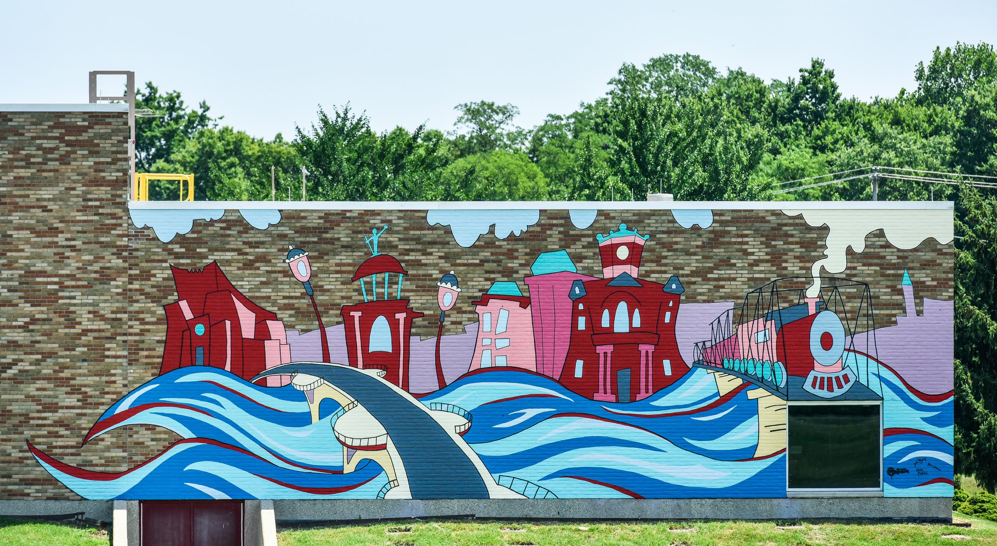 “Paint the Town Red” was completed in early July 2018 on the athletic building on the Miami University Hamilton Campus.