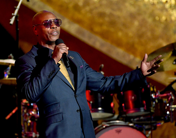 LOS ANGELES, CA - SEPTEMBER 25: Dave Chappelle speaks onstage at Q85: A Musical Celebration for Quincy Jones at the Microsoft Theatre on September 25, 2018 in Los Angeles, California. (Photo by Kevin Winter/Getty Images)